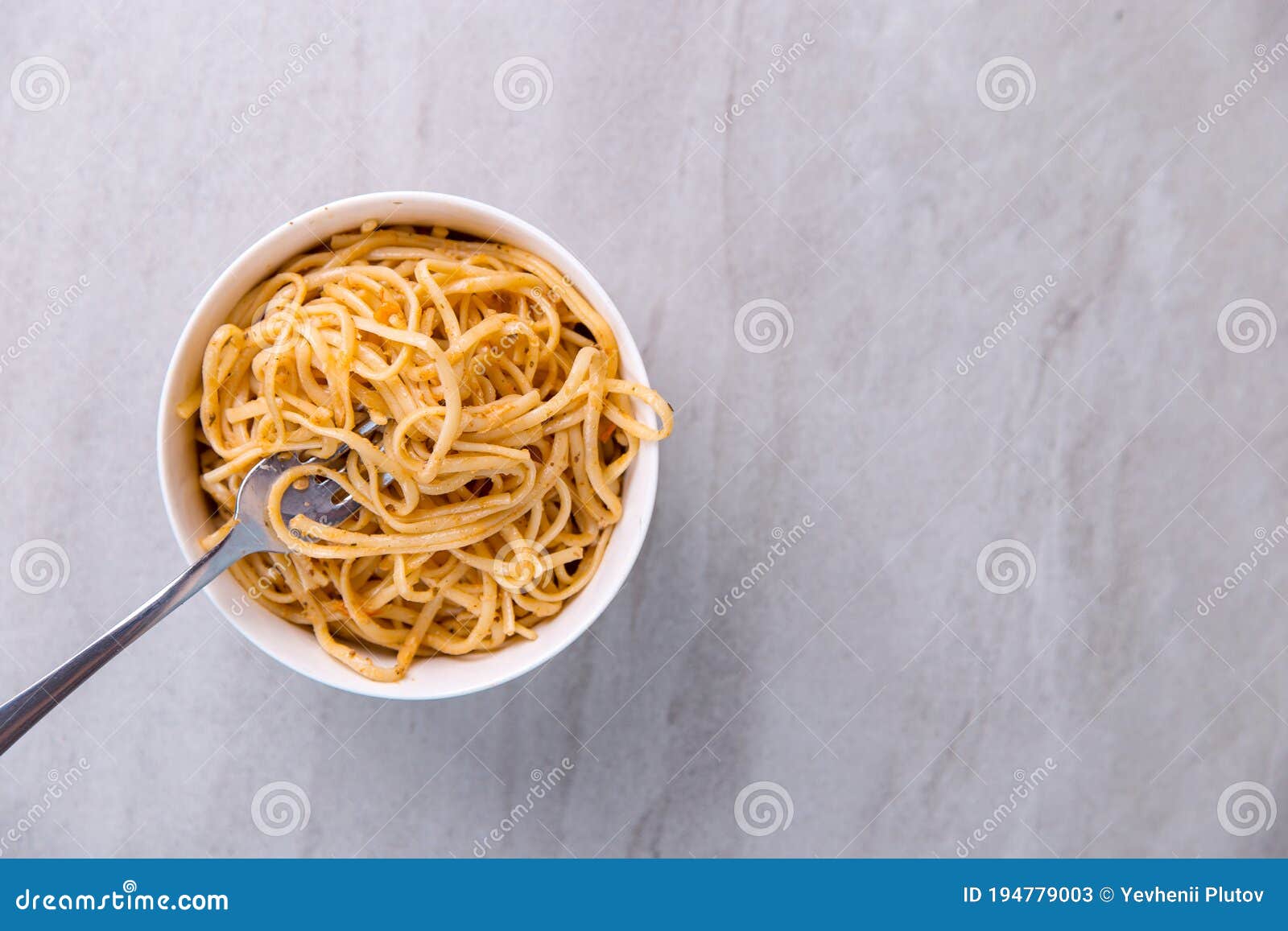 Noodles with Sauce in a Colored Bowl with Fork, Appetite Spaghetti on a