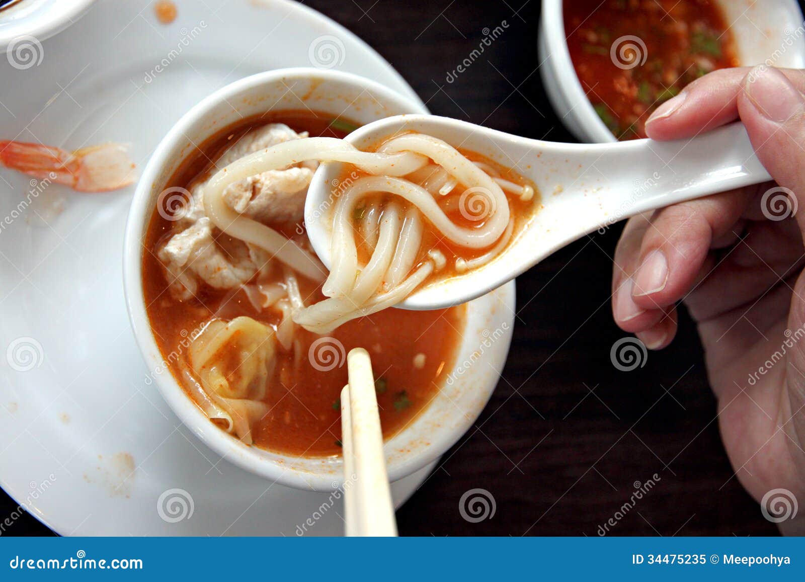 Noodles in the Spoon on Cup of Soup. Stock Image Image of spoon, dish