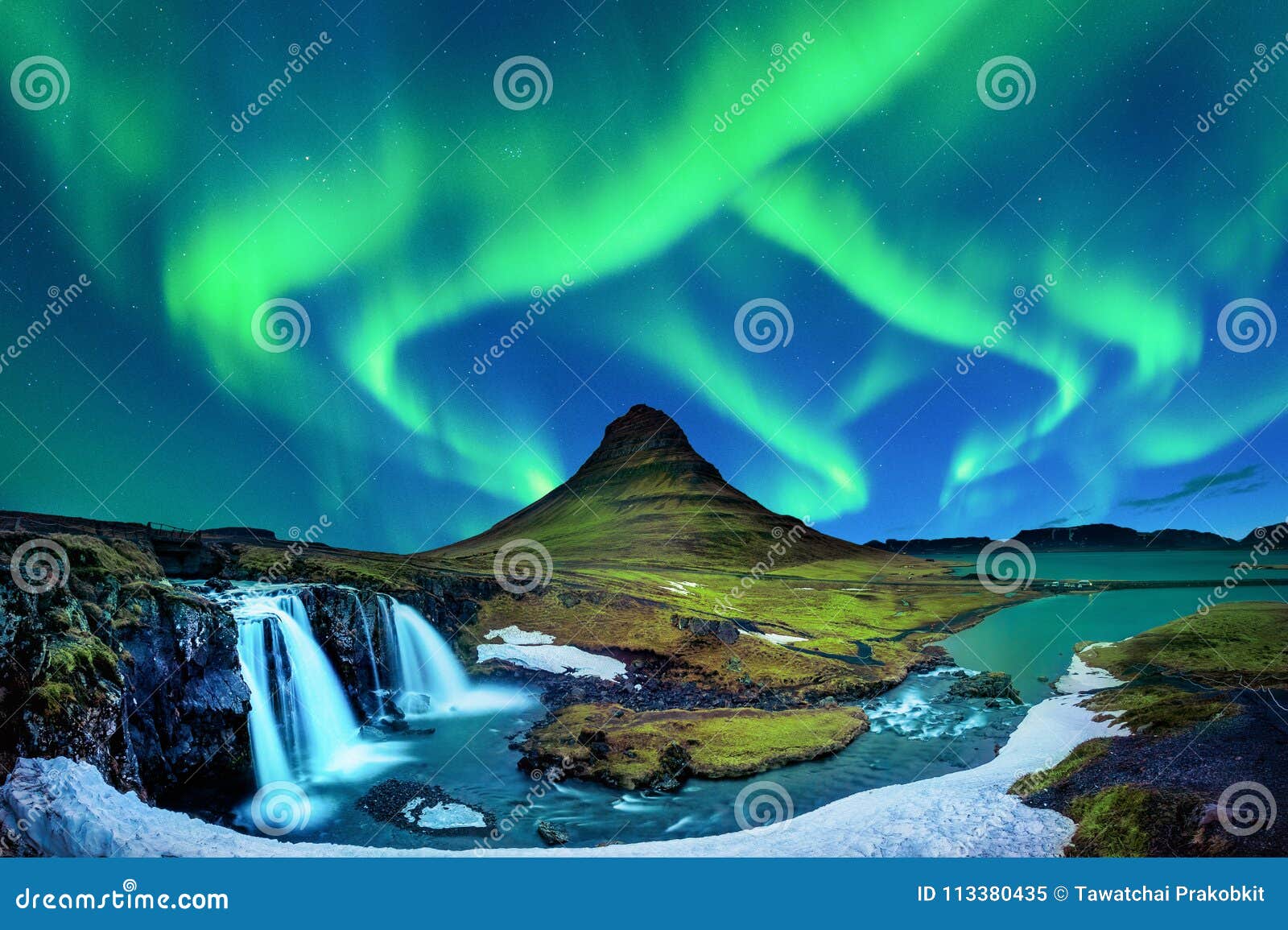 northern light, aurora borealis at kirkjufell in iceland. kirkjufell mountains in winter