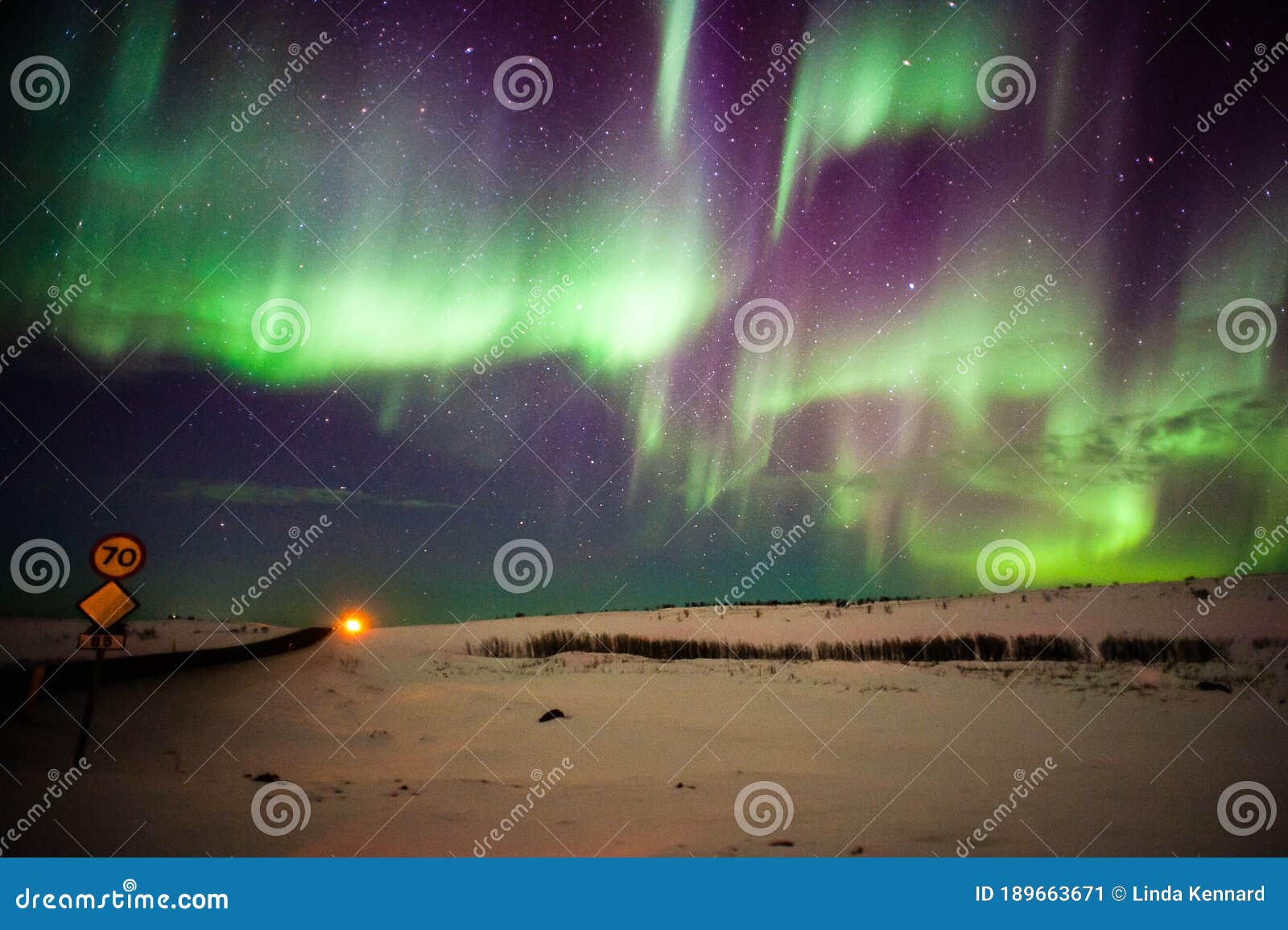 Northern Lights Aurora Borealis Iceland Dramatic Skyshow With Rippling Curtains Of Green And Purple Light Stock Image Image Of Dramatic Astronomy