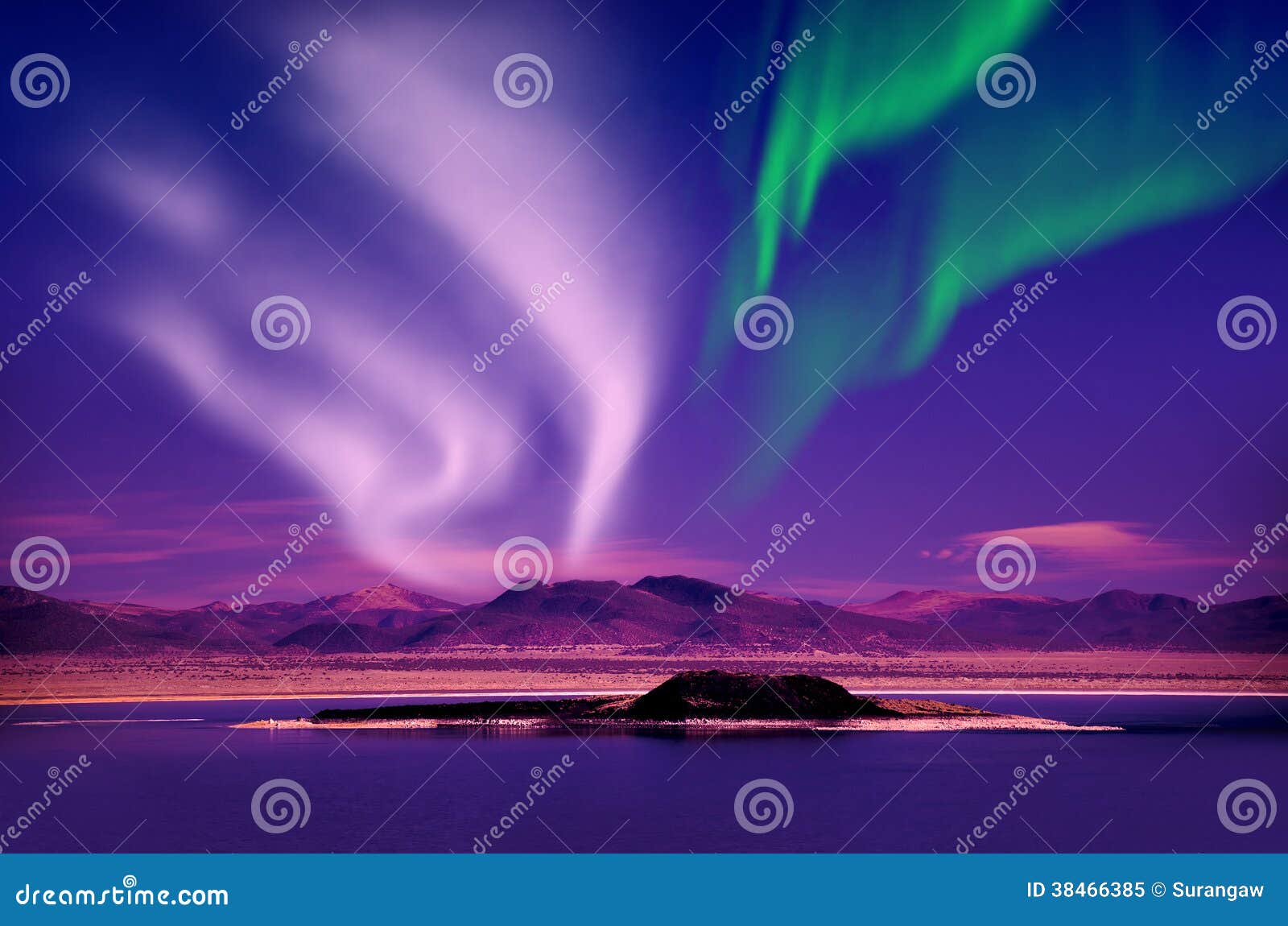 northern lights aurora borealis in the night sky over beautiful lake landscape