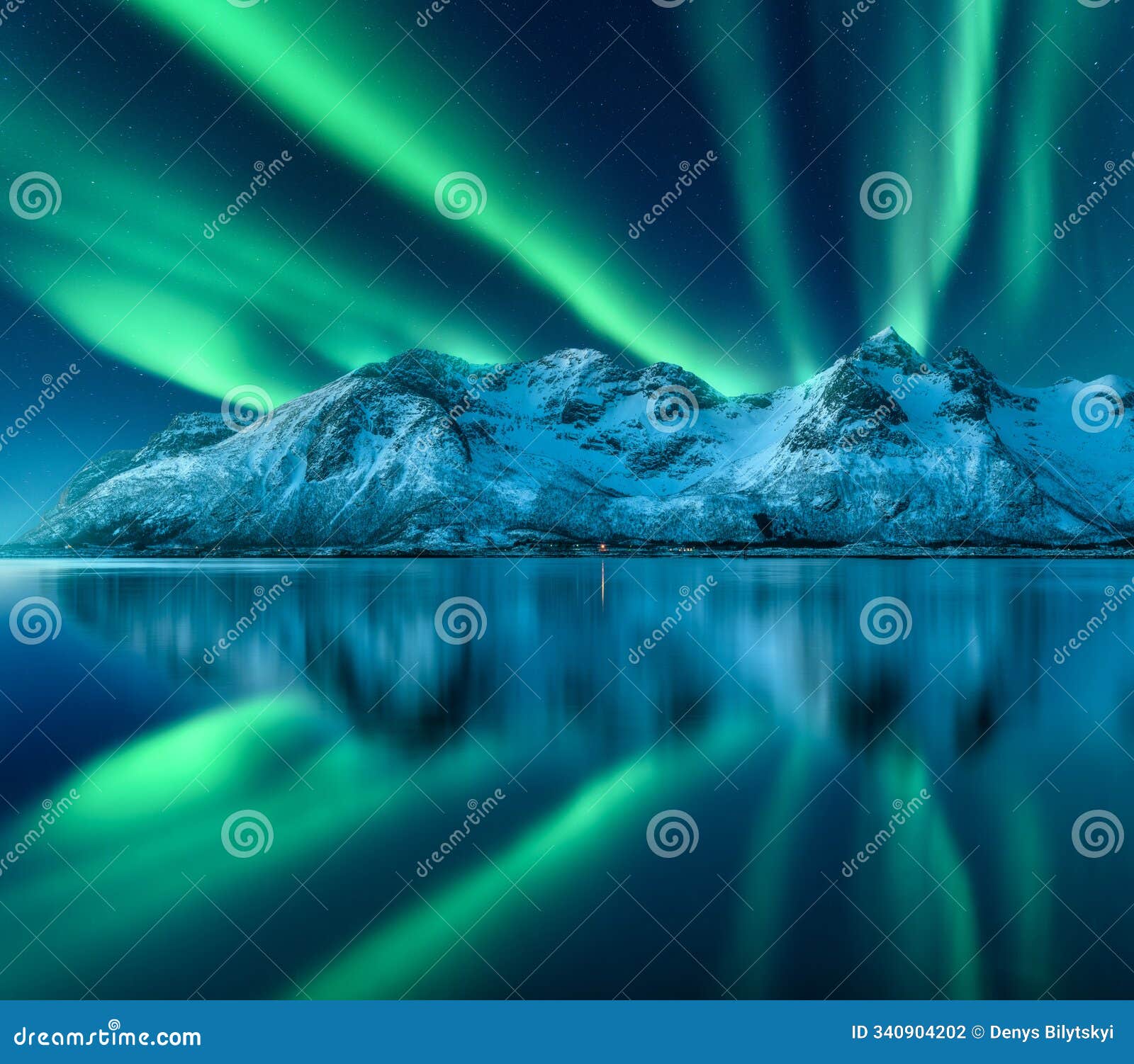 northern lights over the mountain, sea coast, reflection in water