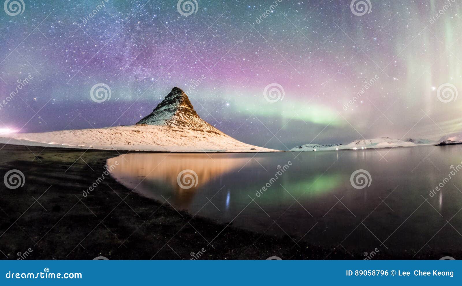 The Northern Lights And Winter Milky Way Over Kirkjufell Royalty Free