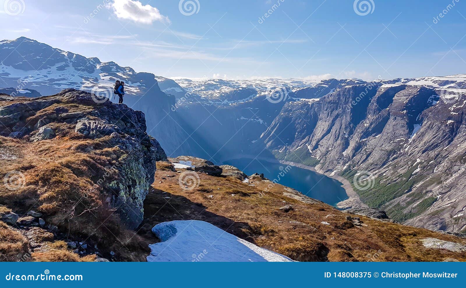 Norway A Man Standing On A Tall Rock With The Lake In The Back Stock Image Image Of Outdoors Hike