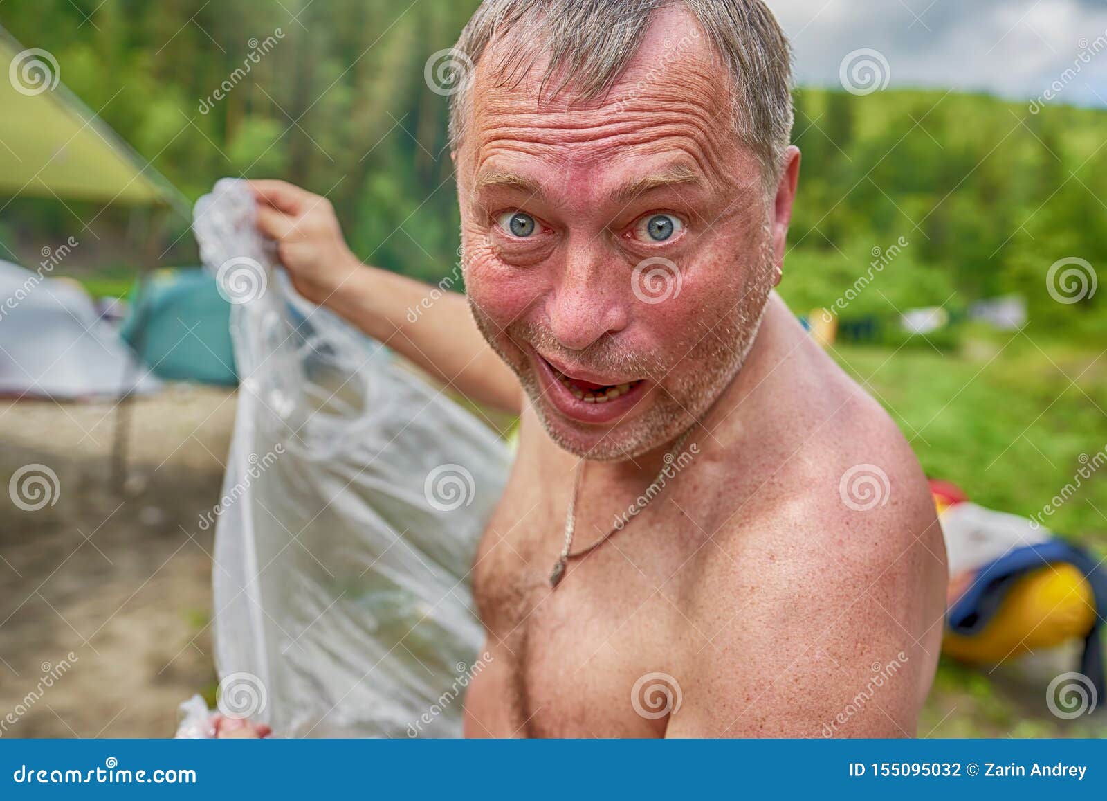 Not Shaved Man with Bulging Eyes Escapes from the Rain Stock Photo - Image  of closeup, poor: 155095032