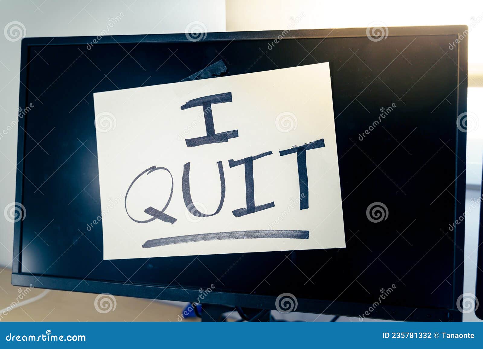 note on a monitor of a work computer with the text i quit. great resignation concept
