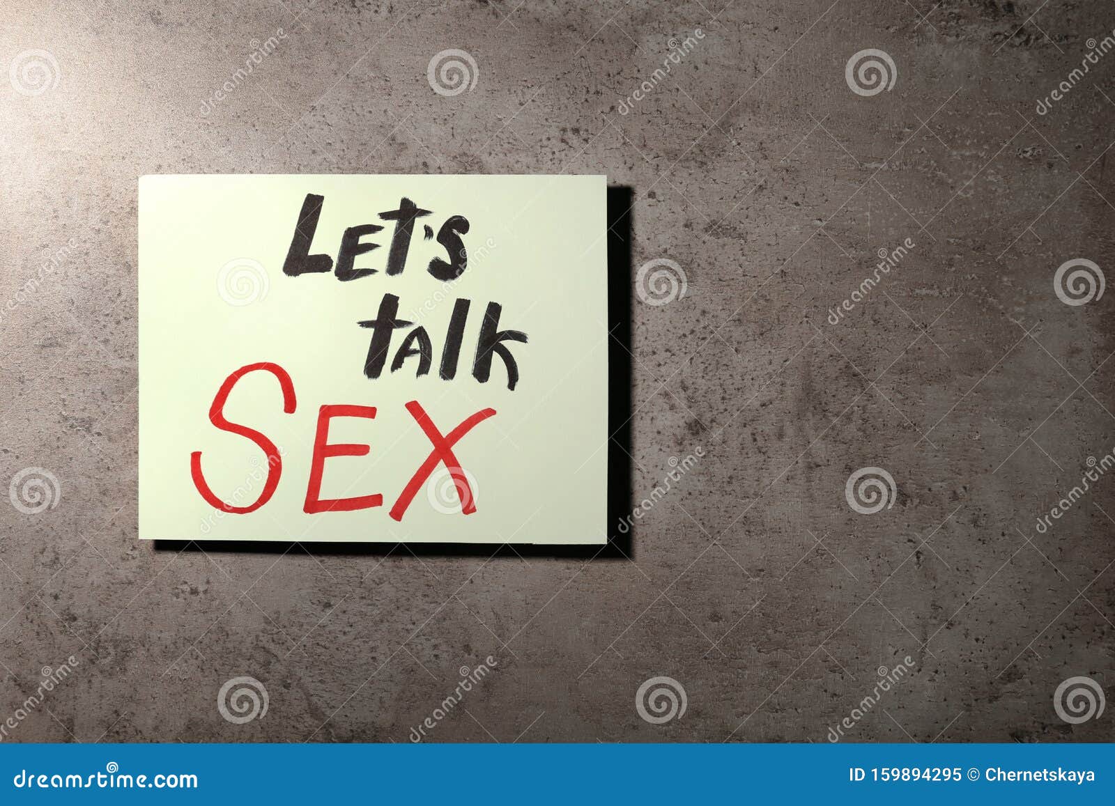 Note With Phrase `let`s Talk Sex` On Stone Background Stock Image