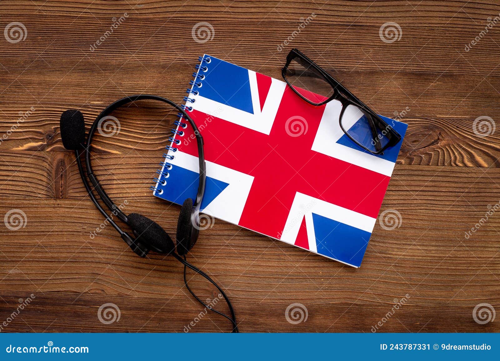 Notebook with British Flag and Headphones. English Lessons Concept