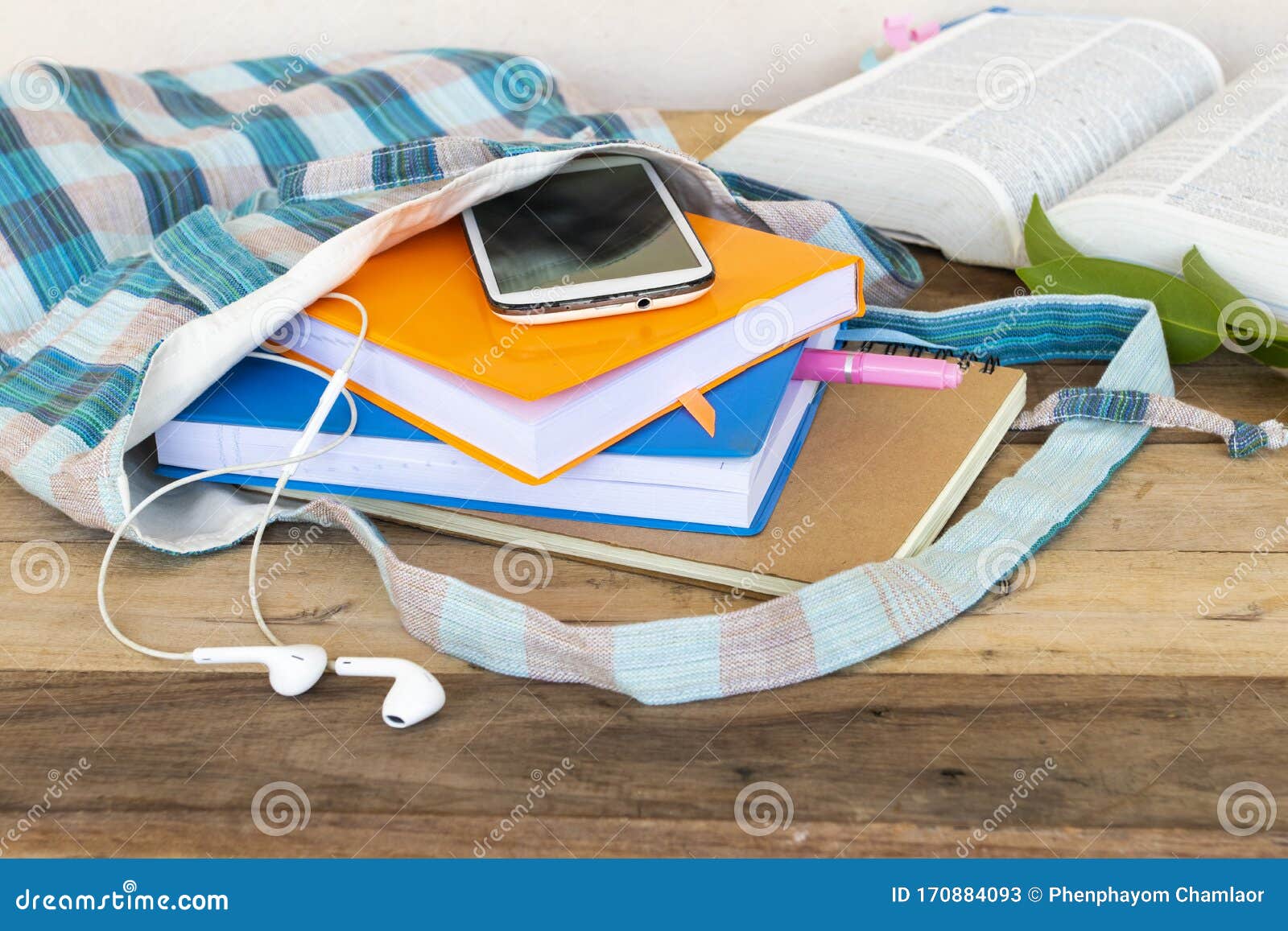 Notebook ,diary and Mobile Phone in Cloth Bag with Dictionary Book for