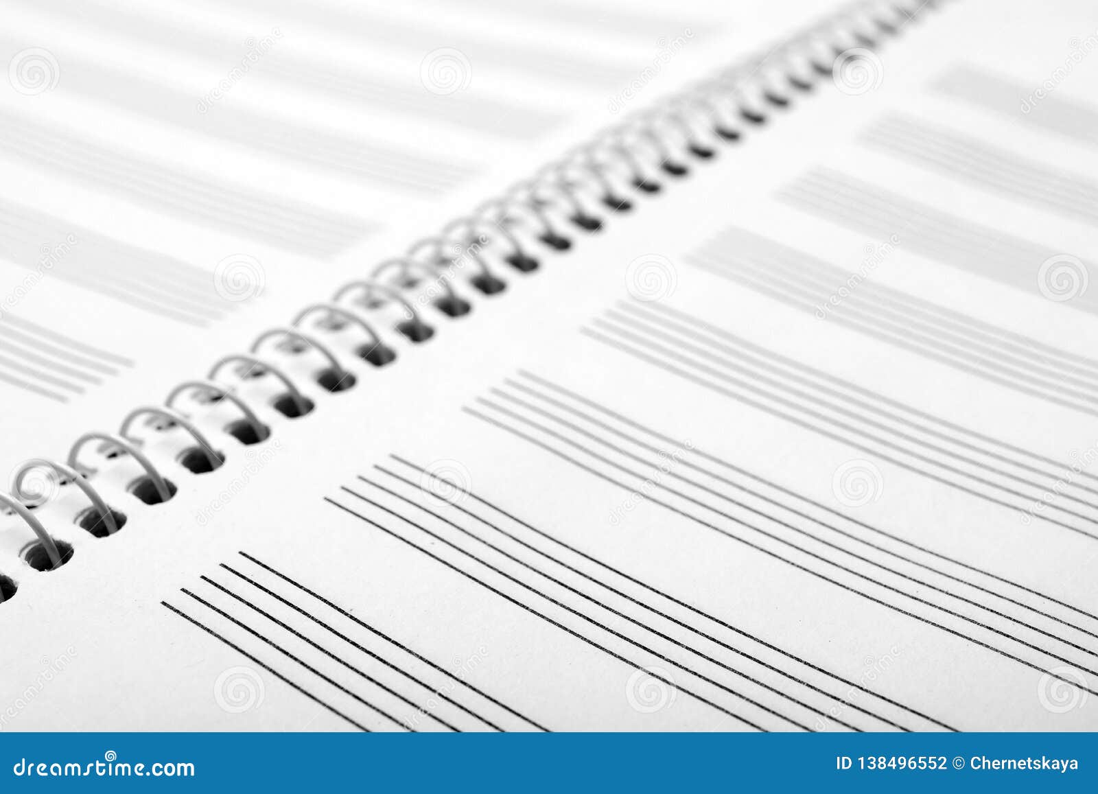 Notebook with Empty Staves for Music Notes As Background Stock Photo
