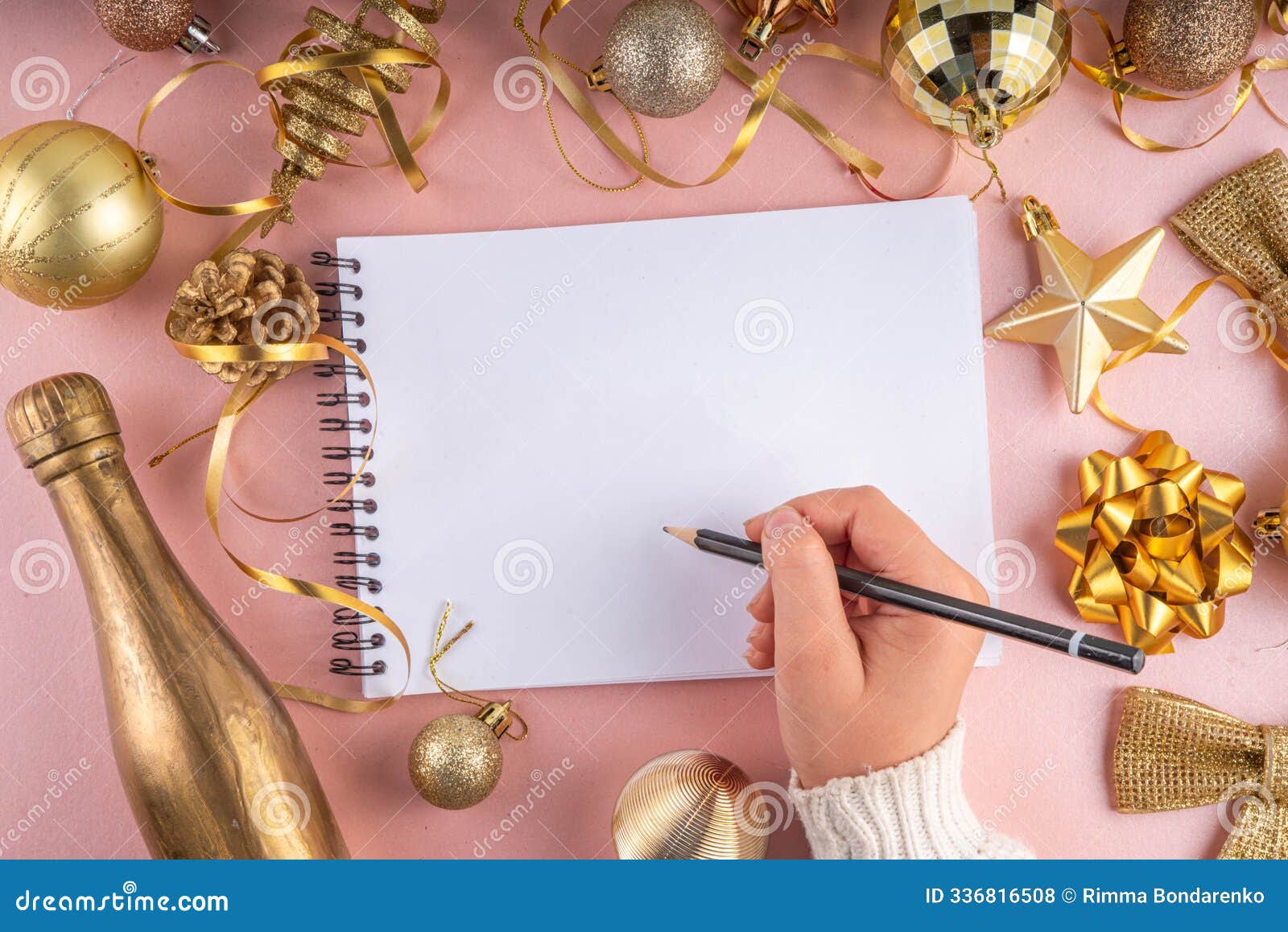 notebook with new's year resolutions, to do list, wishlist