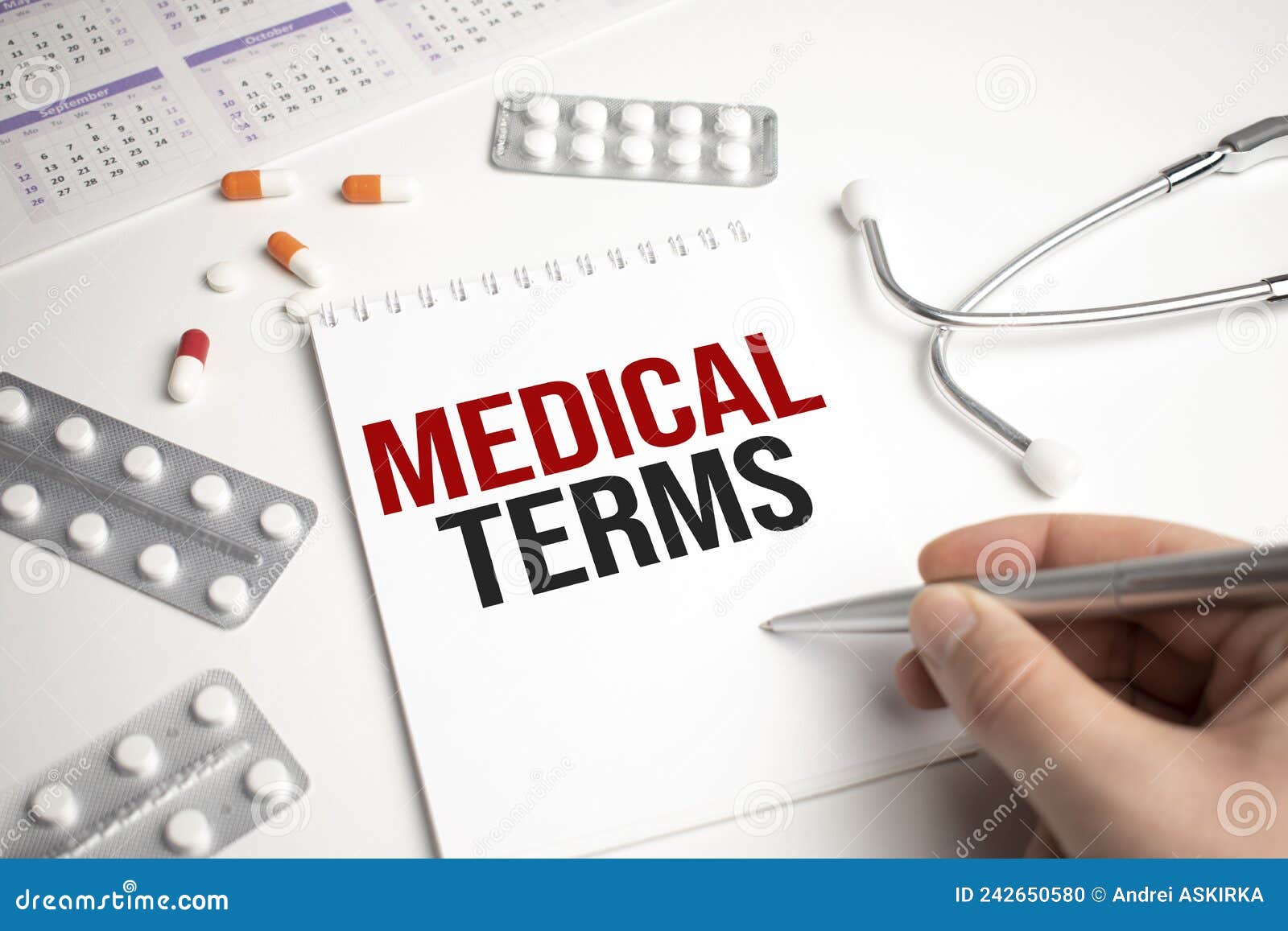 In the Notebook the Text Medical TERM, Next To it are Tablets Stock