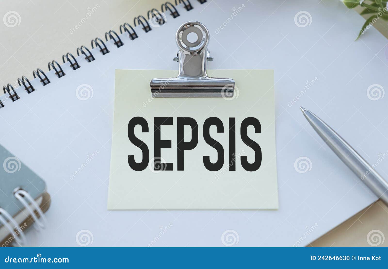 notebook with text sepsis with pen and stethoscope, medicina