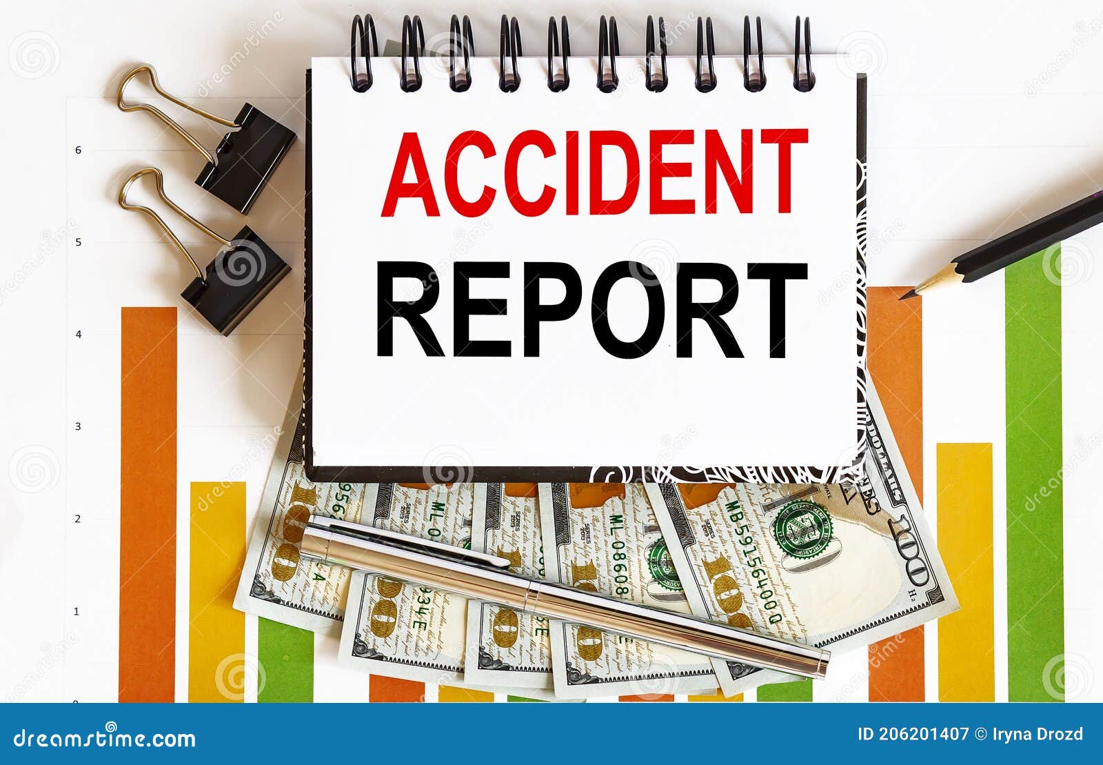 notebook with tools and notes about accident report,business concept