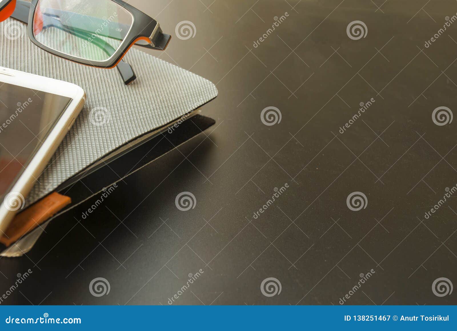 Notebooks And Mobile Phones Glasses In The Desk Stock Image