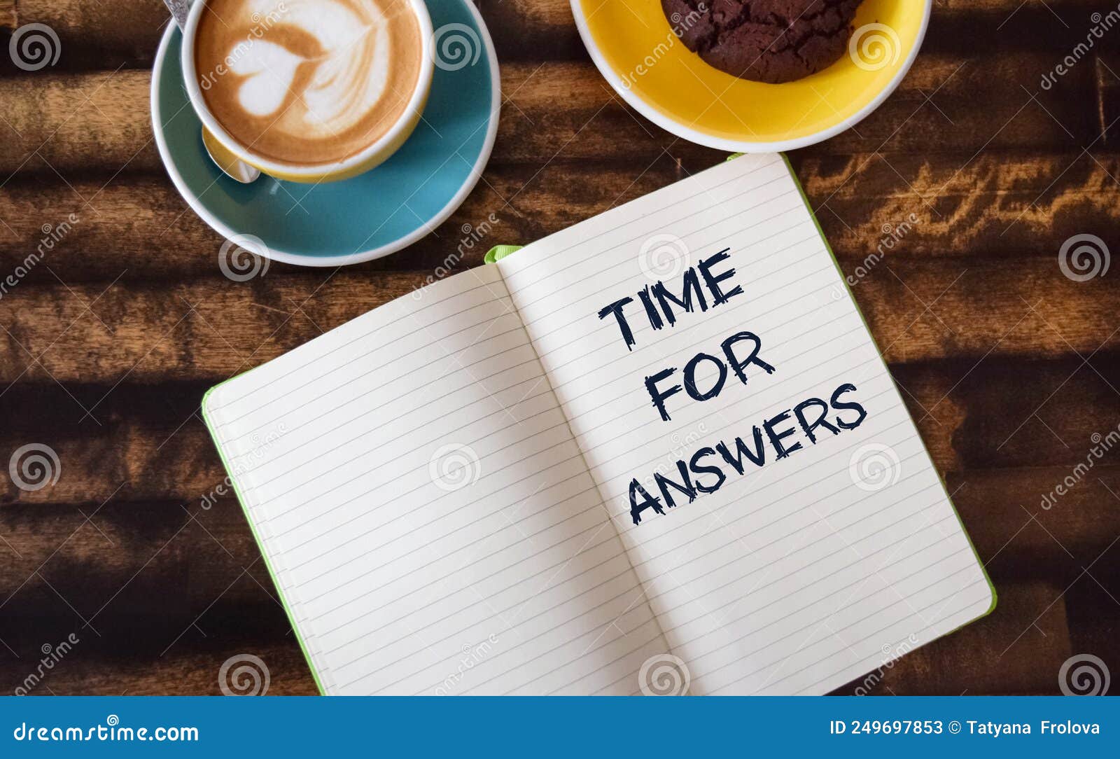 notepad with the inscription time for answers. a cup of coffee on a table in an ooffice or at a business lunch, concept image.