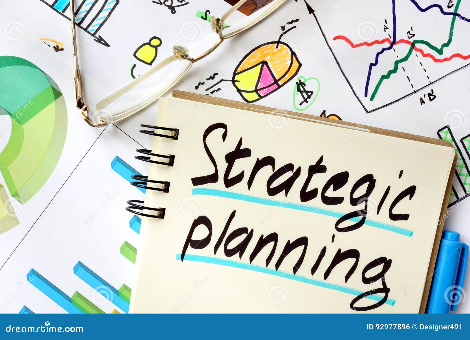 notepad with sign strategic planning.