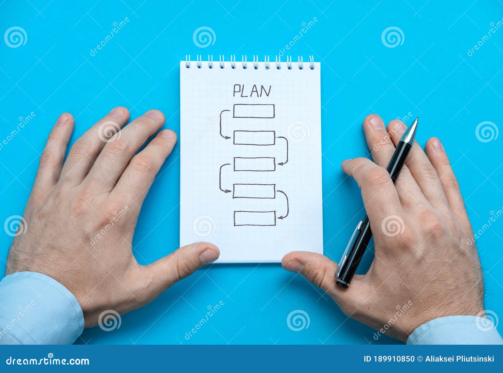 Notepad with a Step-by-step Action Plan and Pen Ready To Be