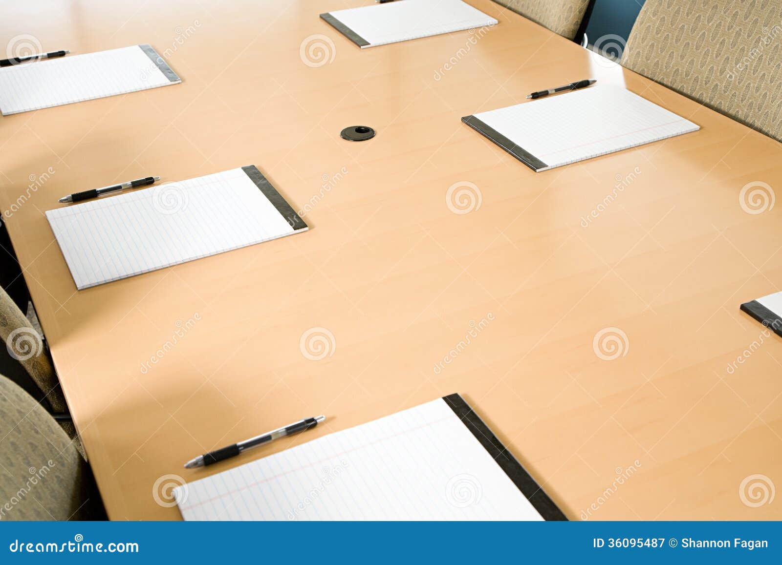 notepads on conference table