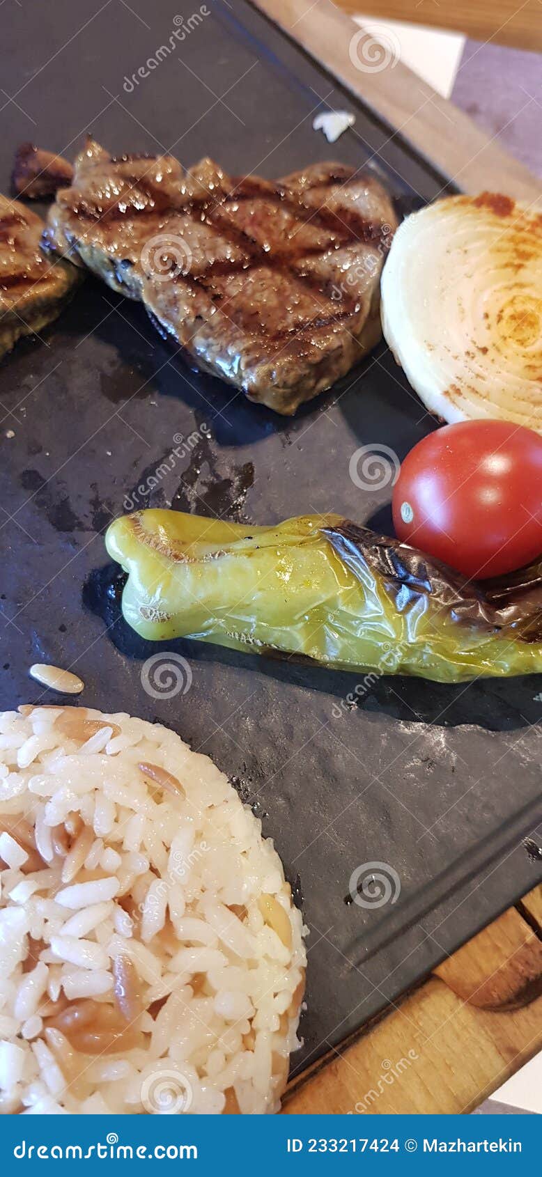 Nothing Like a Delicious Grilled Meat, with Side Dishes Stock Photo