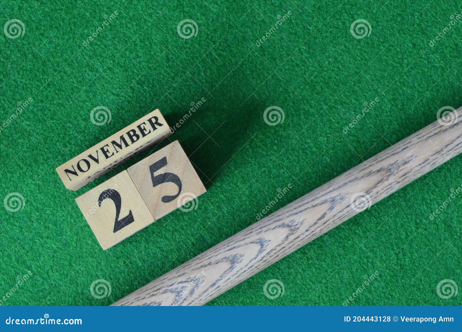 november 25, number cube on snooker table, sport background.