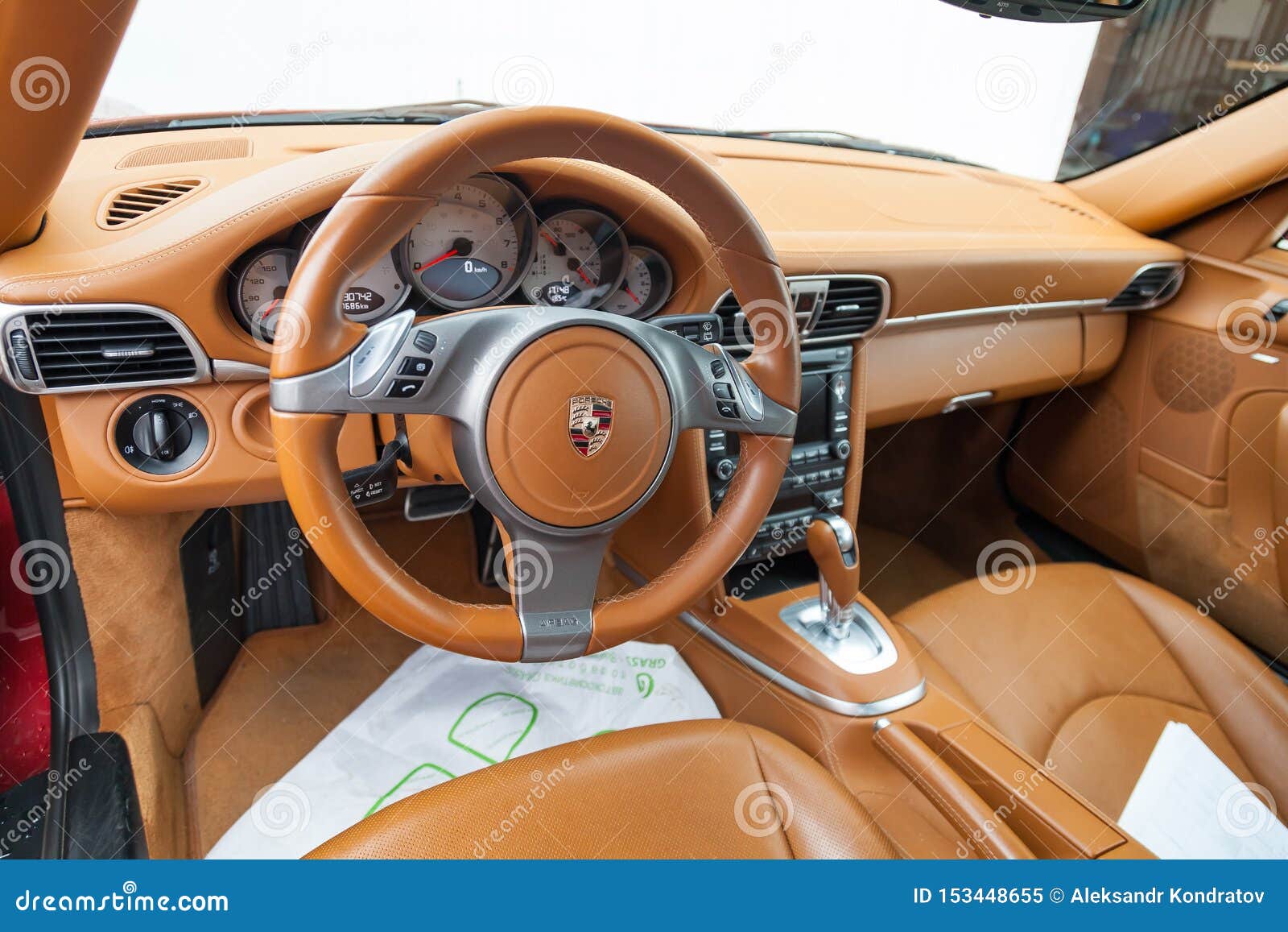 View To the Interior of Porsche Carrera 4s 911 with Dashboard, Clock, Media  System, Front Seats and Shiftgear after Cleaning Editorial Image - Image of  closeup, emblem: 153448655