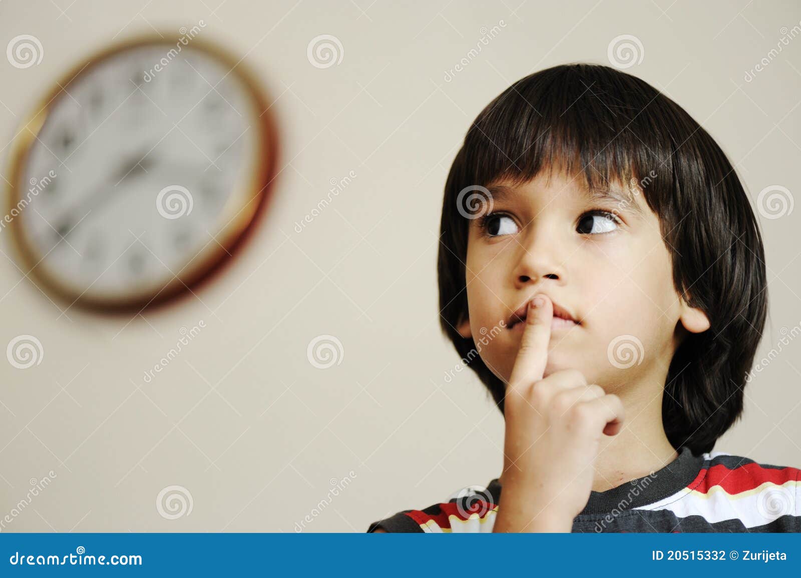 Now is the Time? Kid and Clock Stock Photo Image of face, expression