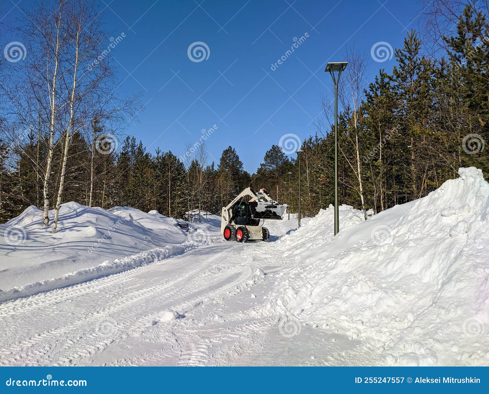 Noyabrsk, Russia - April 1, 2022: Lonking CDM312 Skid Steer Clears a