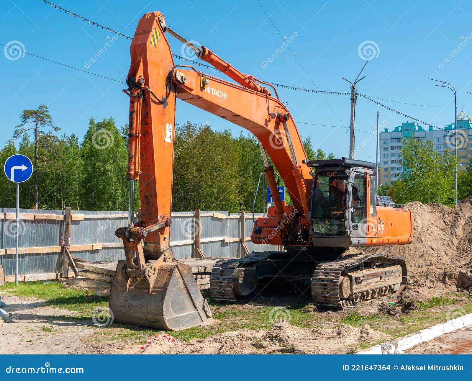 Noyabrsk, Russia - June 5, 2021: Hitachi`s Orange Excavator Stands at a