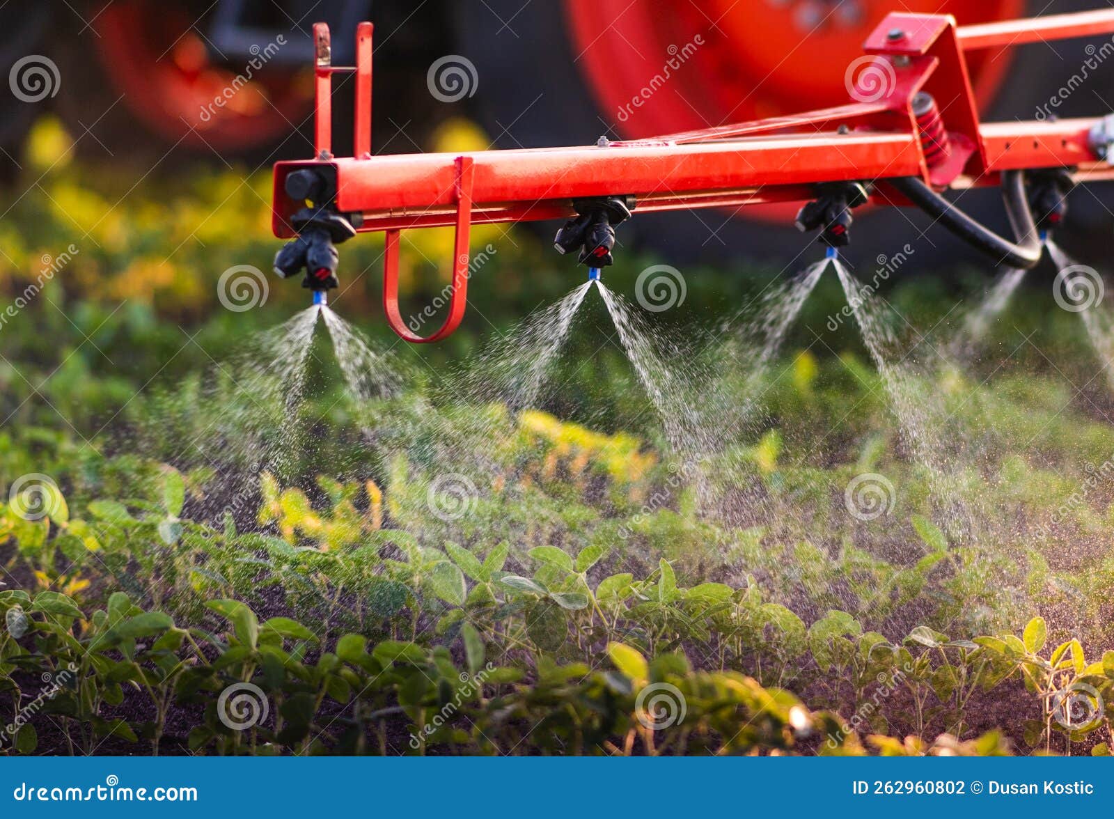 Nozzle of the Tractor Sprinklers Stock Photo Image of field