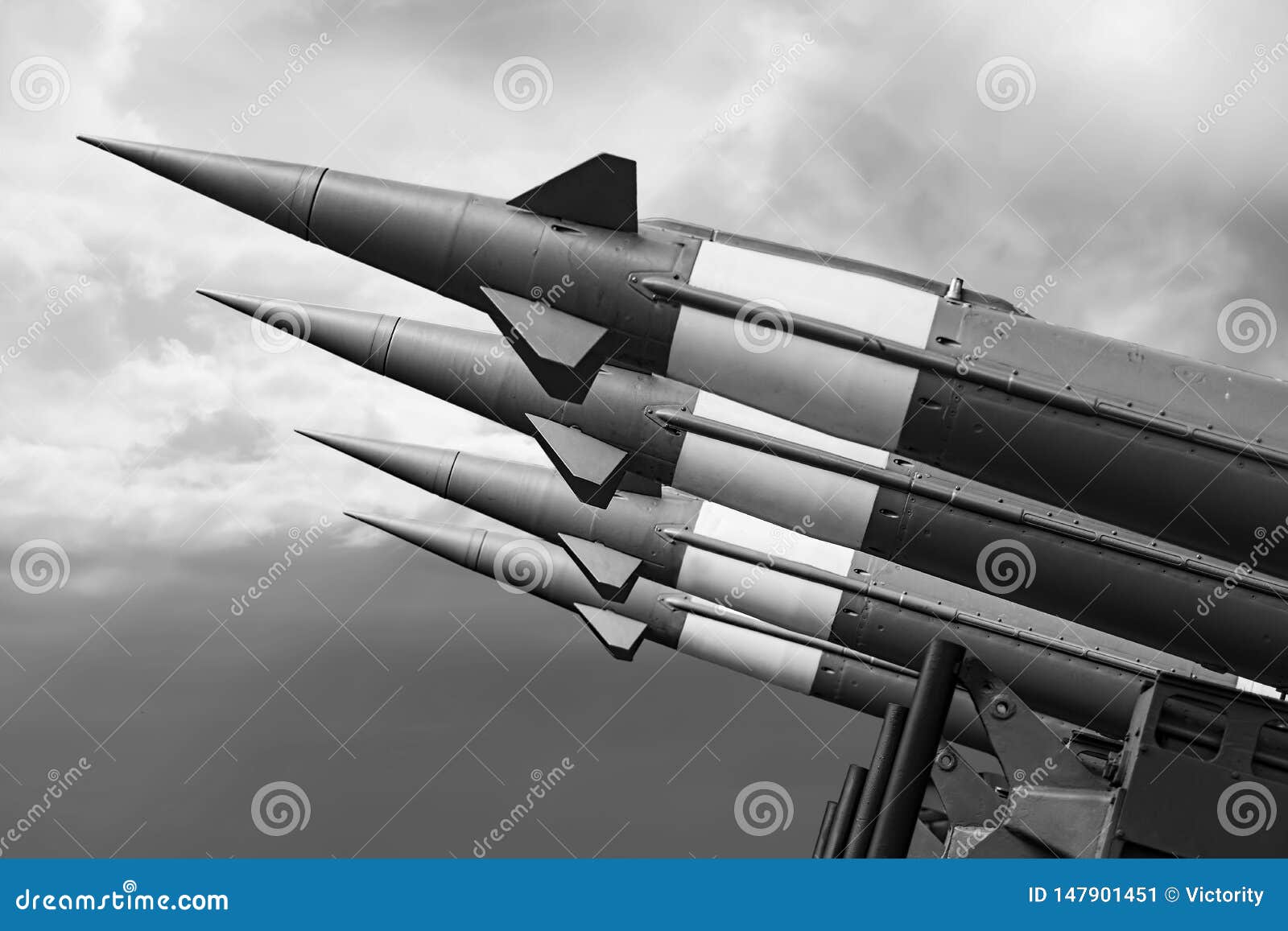 nuclear missiles with warhead aimed at gloomy sky
