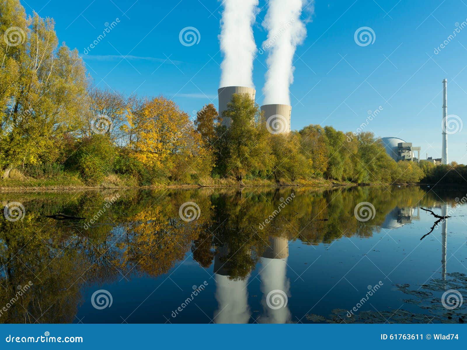 Nuclear Power Plant Next Pond and Its Reflection in the Water Stock