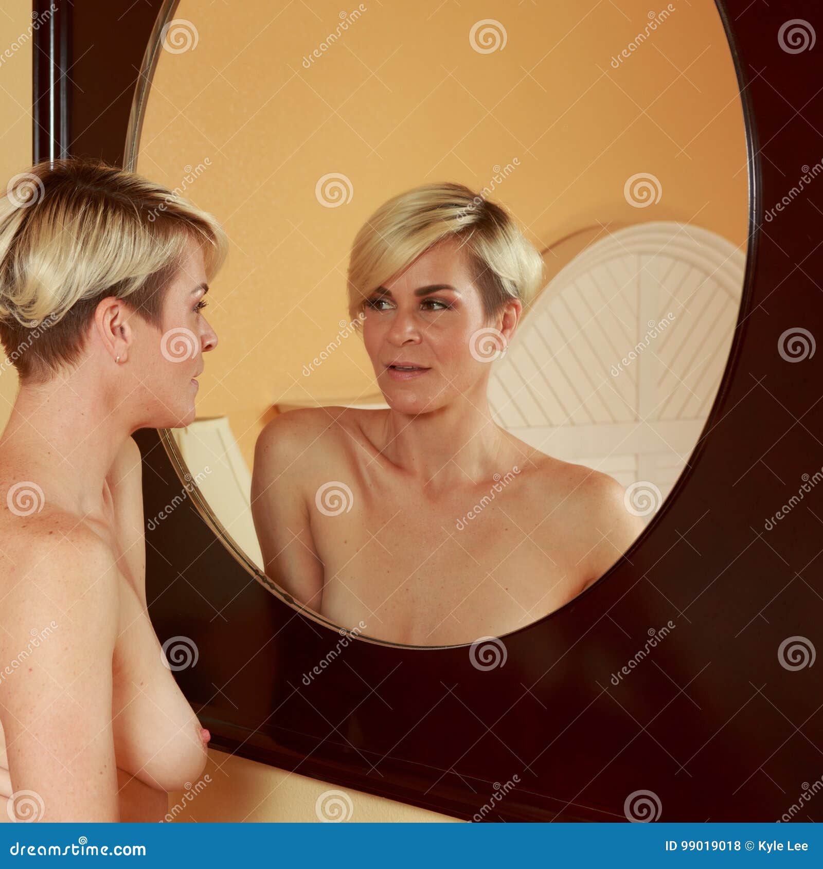 Nude Blonde woman in Hotel stock photo