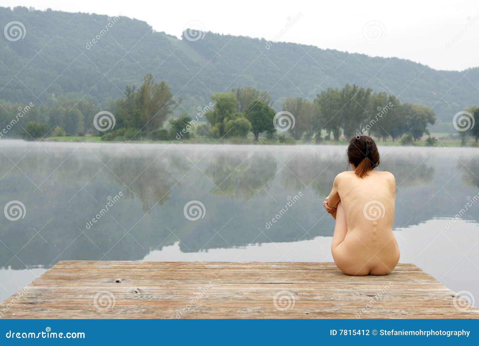 Nude by the lake