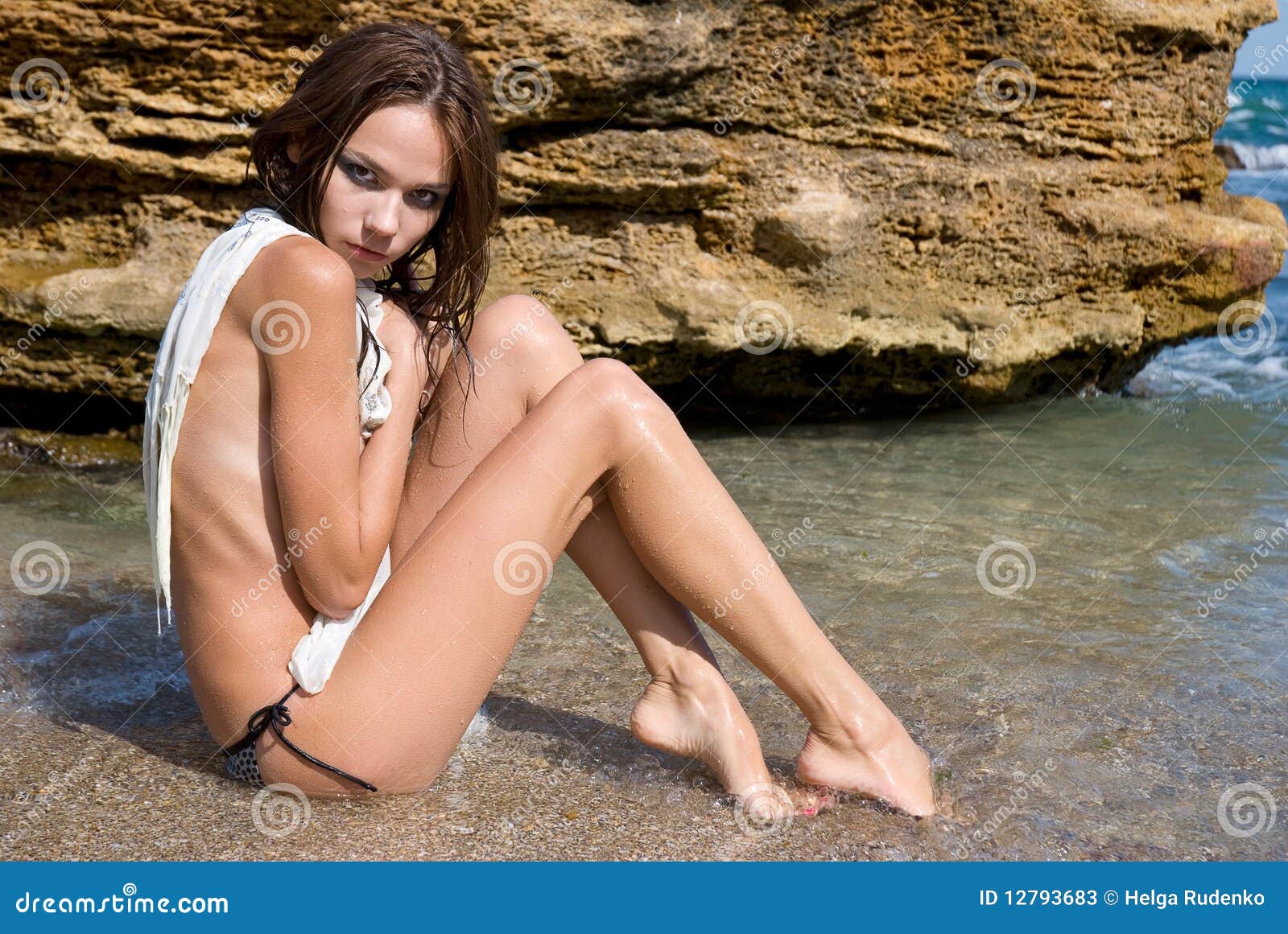 Nude Young Girl in the Beach Stock Image picture