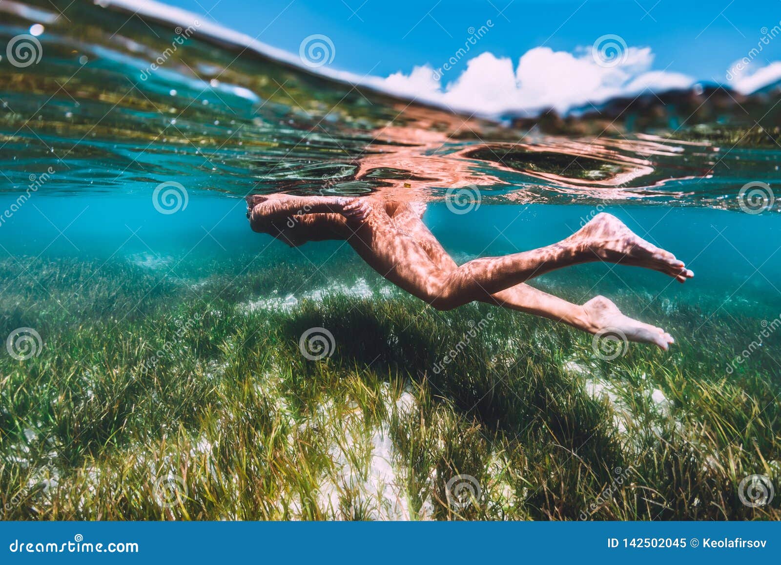 Naked Woman Swimming In Water