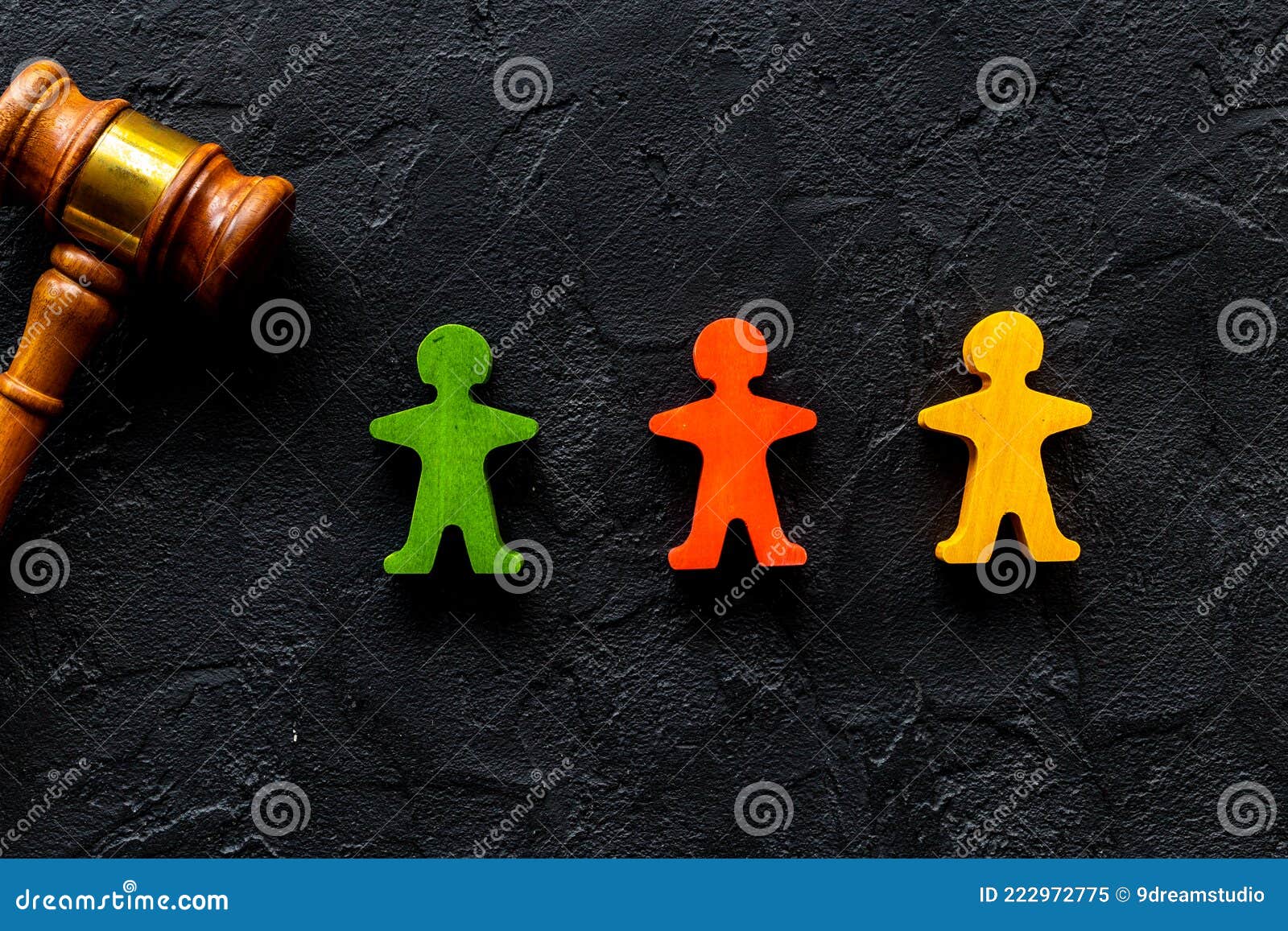 numan wooden figurines with judge gavel. resolving conflict situation
