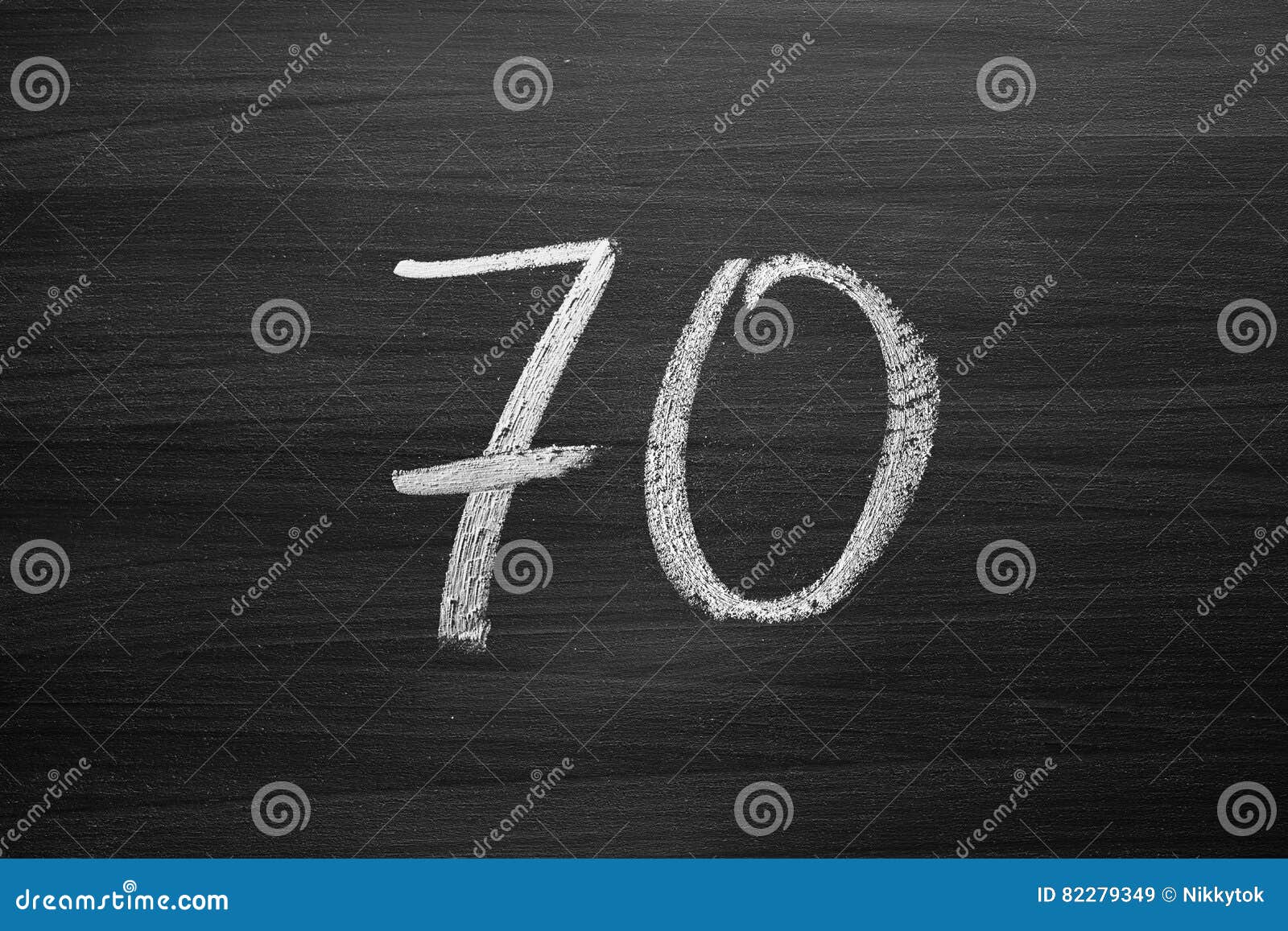 S E V E N T Y Number Seventy Enumeration Written with a Chalk on the Blackboard Stock
