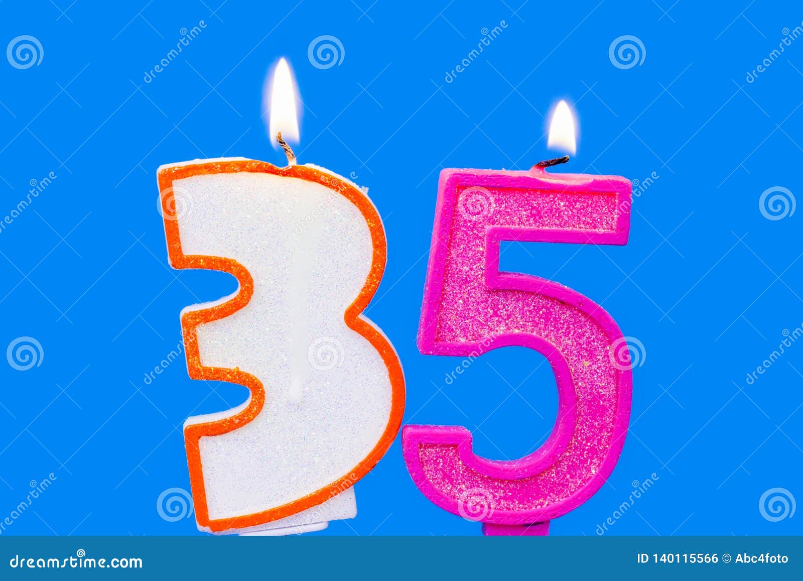 Number Thirty Five Shaped Burning Candle on Blue Stock Photo - Image of ...