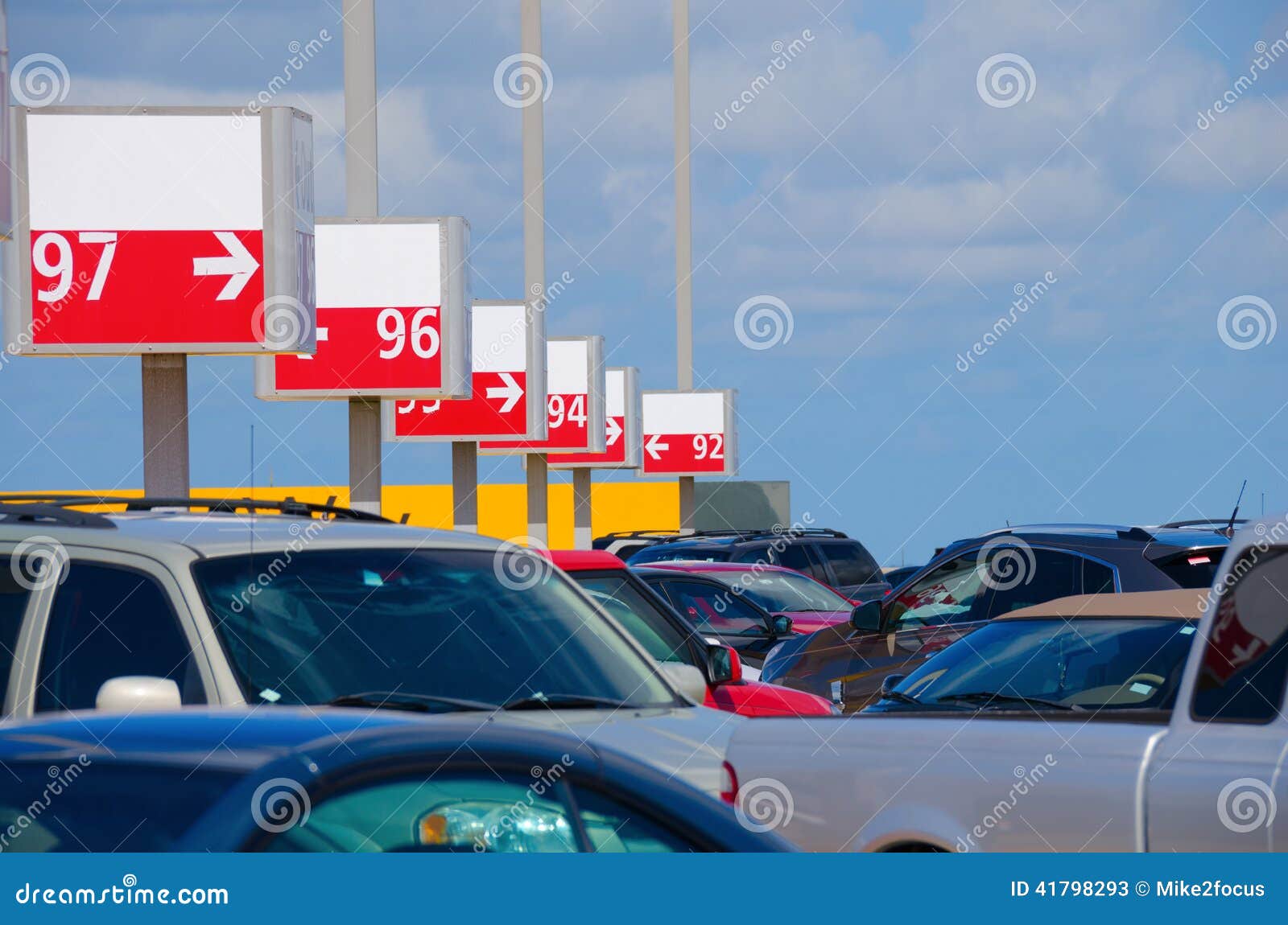Numbered Parking Lot With Many Cars Stock Image - Image of automobiles
