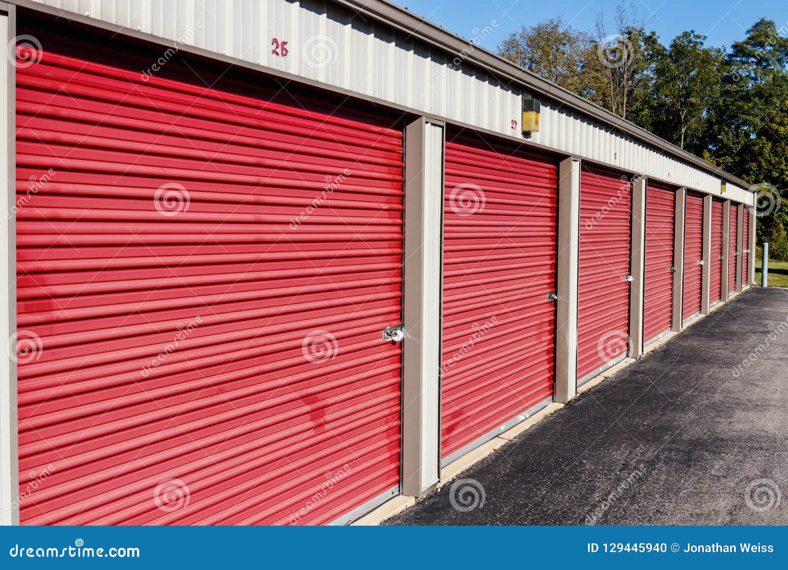 Numbered Red Self Storage and Mini Storage Garage Units Stock Photo