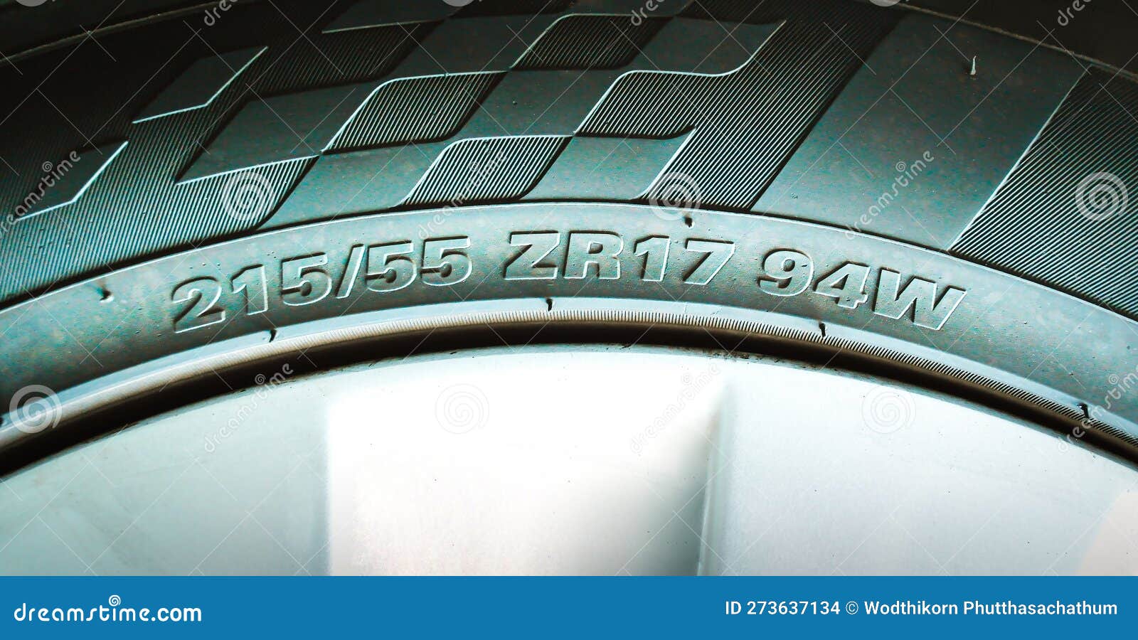 numbers and characters on the sidewall of a car tire