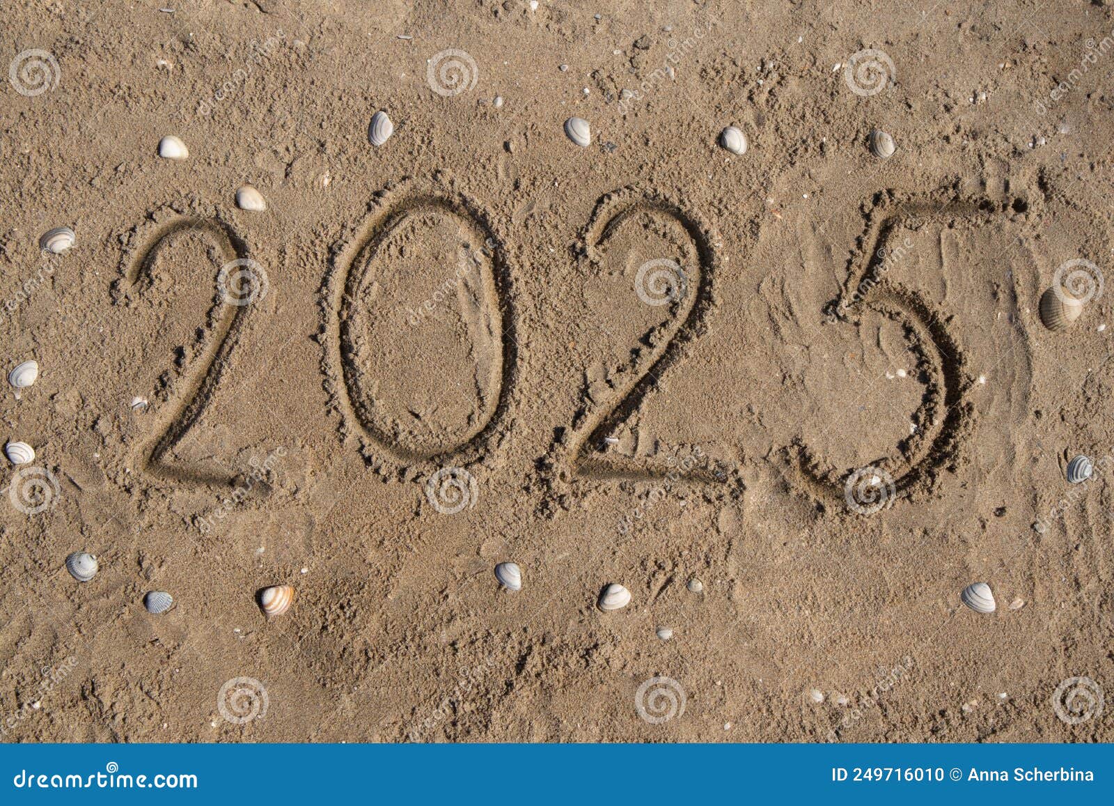 The Numbers 2025 are Written by Hand on the Sand, on the Seashore