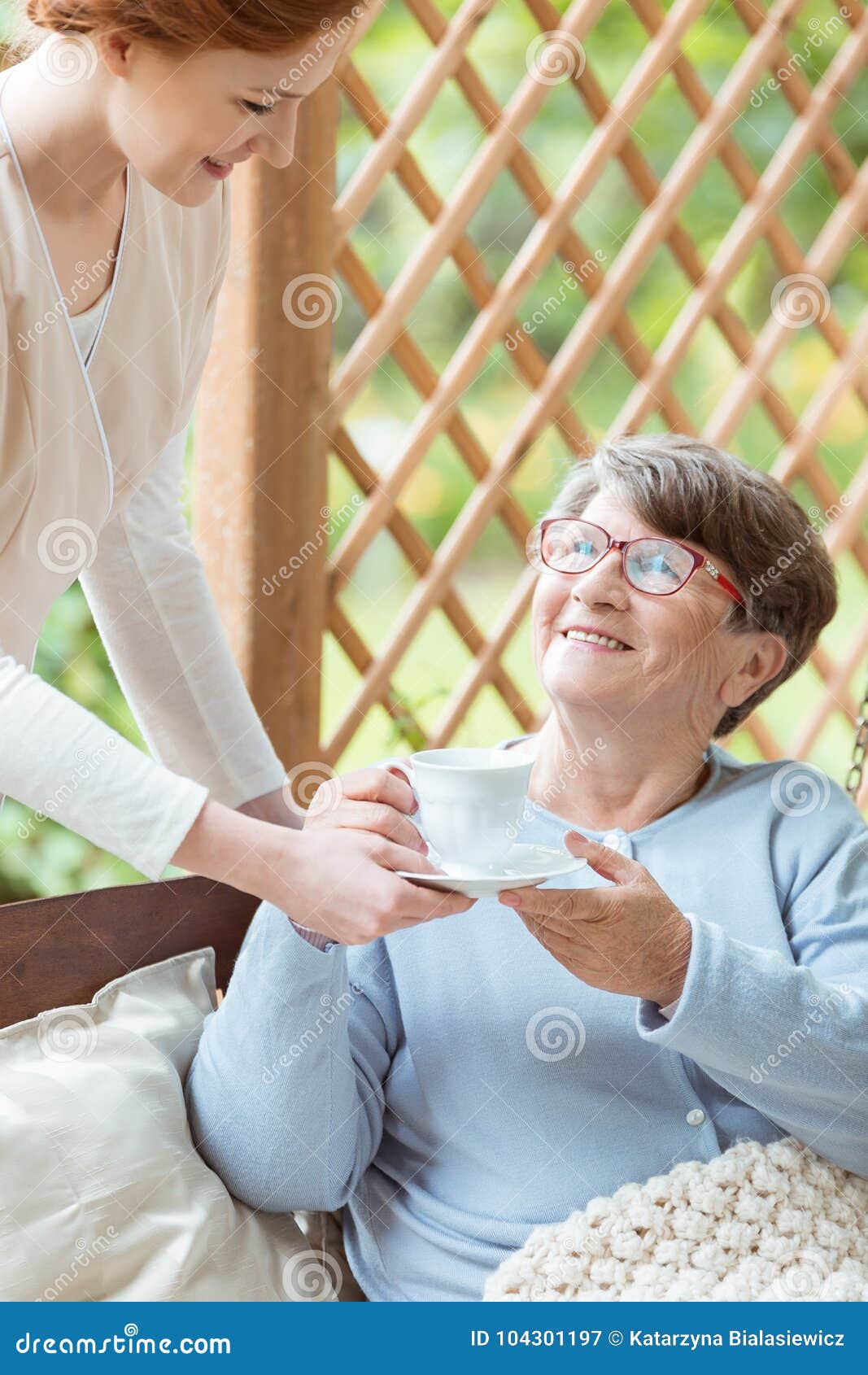 Nurse Bringing Tea To Senior Stock Image - Image of elder, blanket ...