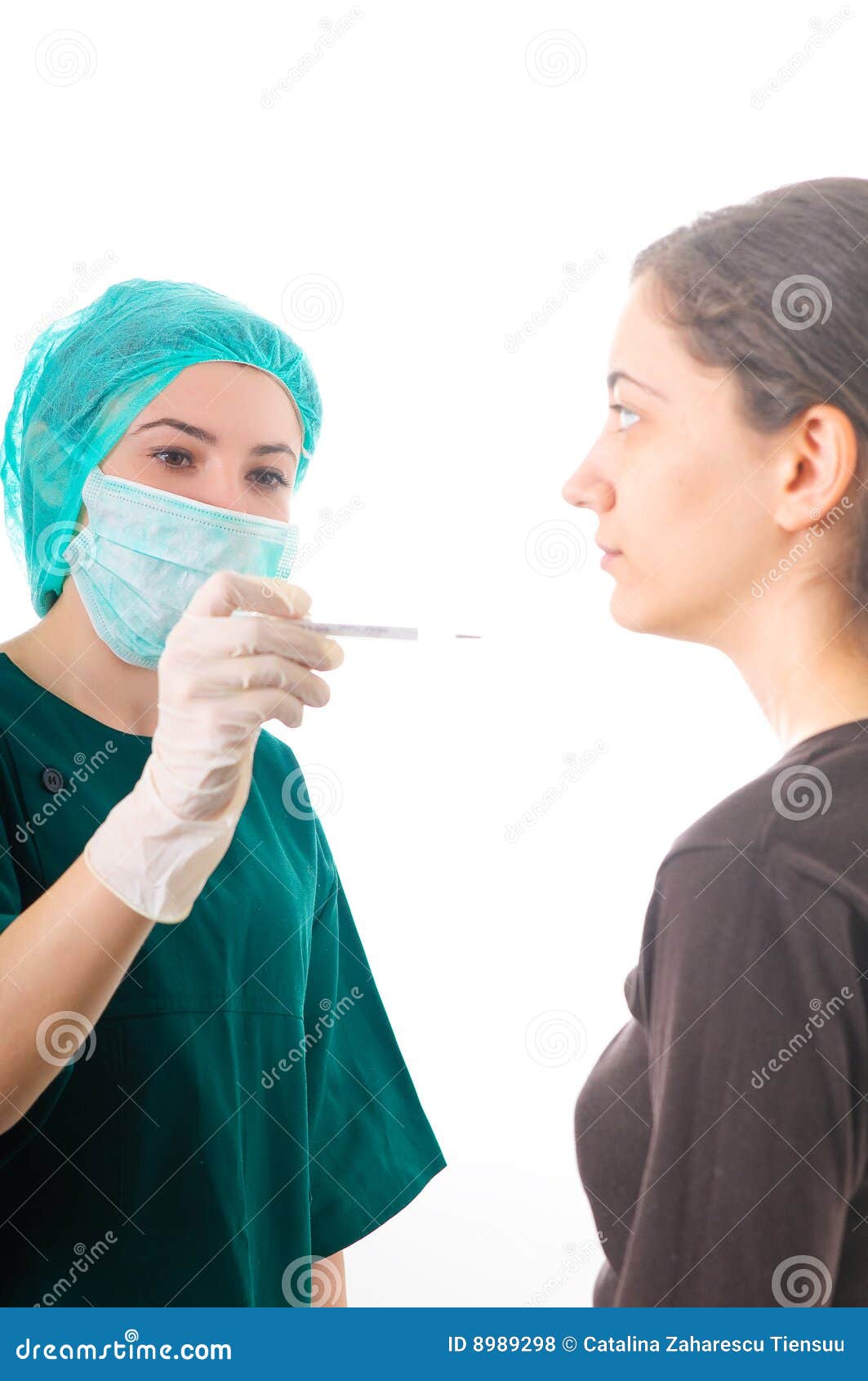 Nurse Checking A Patient's Temperature Royalty Free Stock Photos