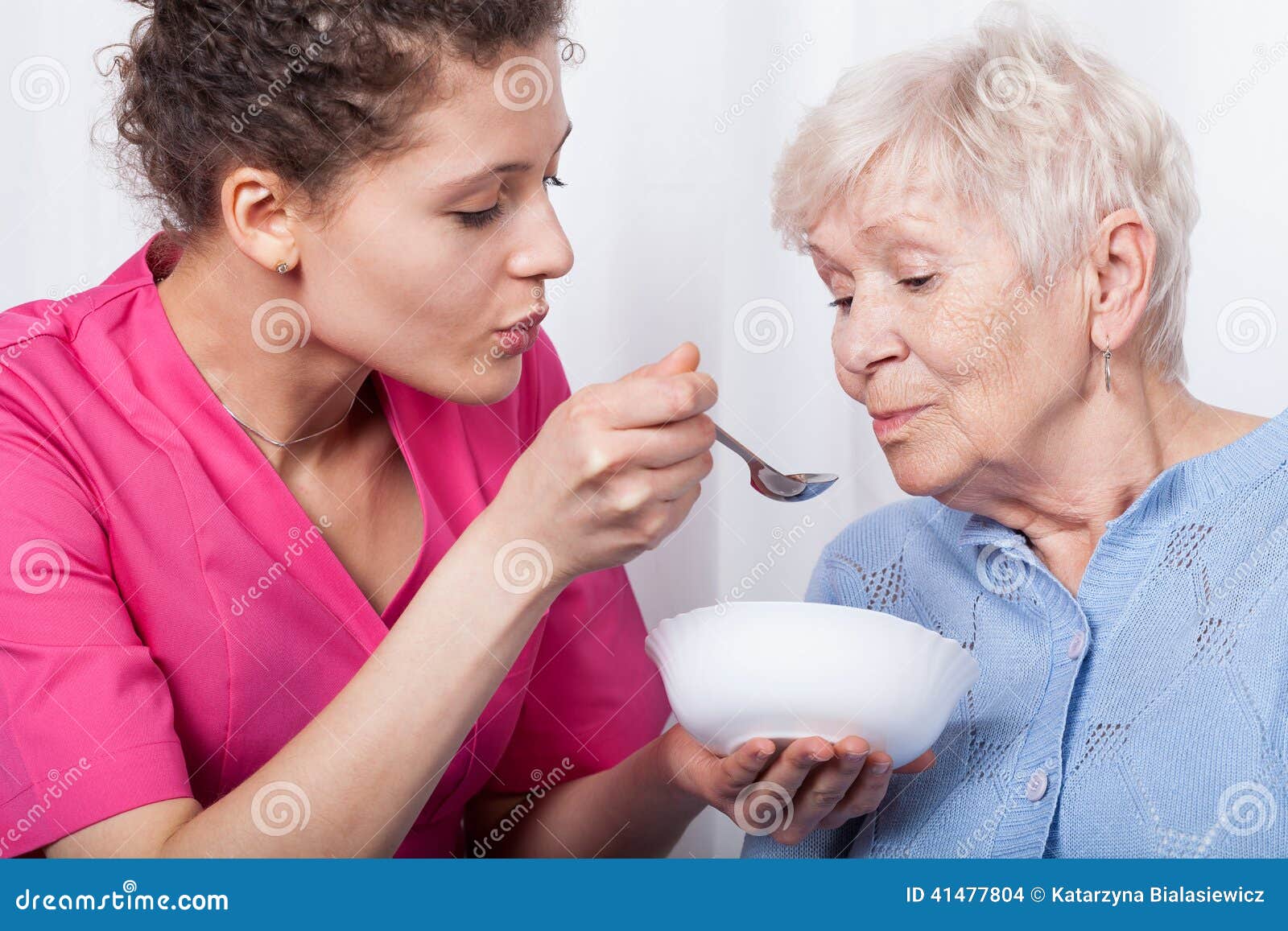 Nurse Feeding an Older Lady Stock Photo Image of home, daughter 41477804