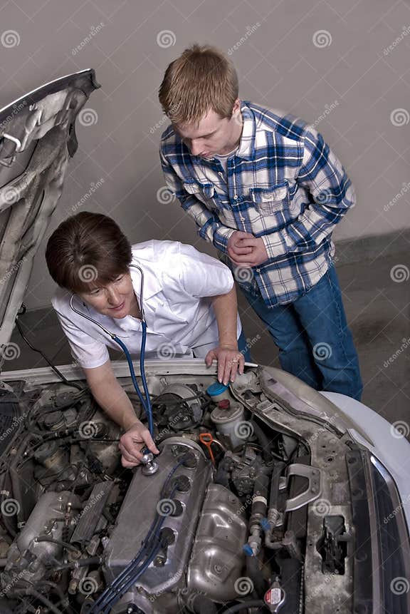 Nurse Gives Car Engine a Check Up Stock Image Image of nurse, hood
