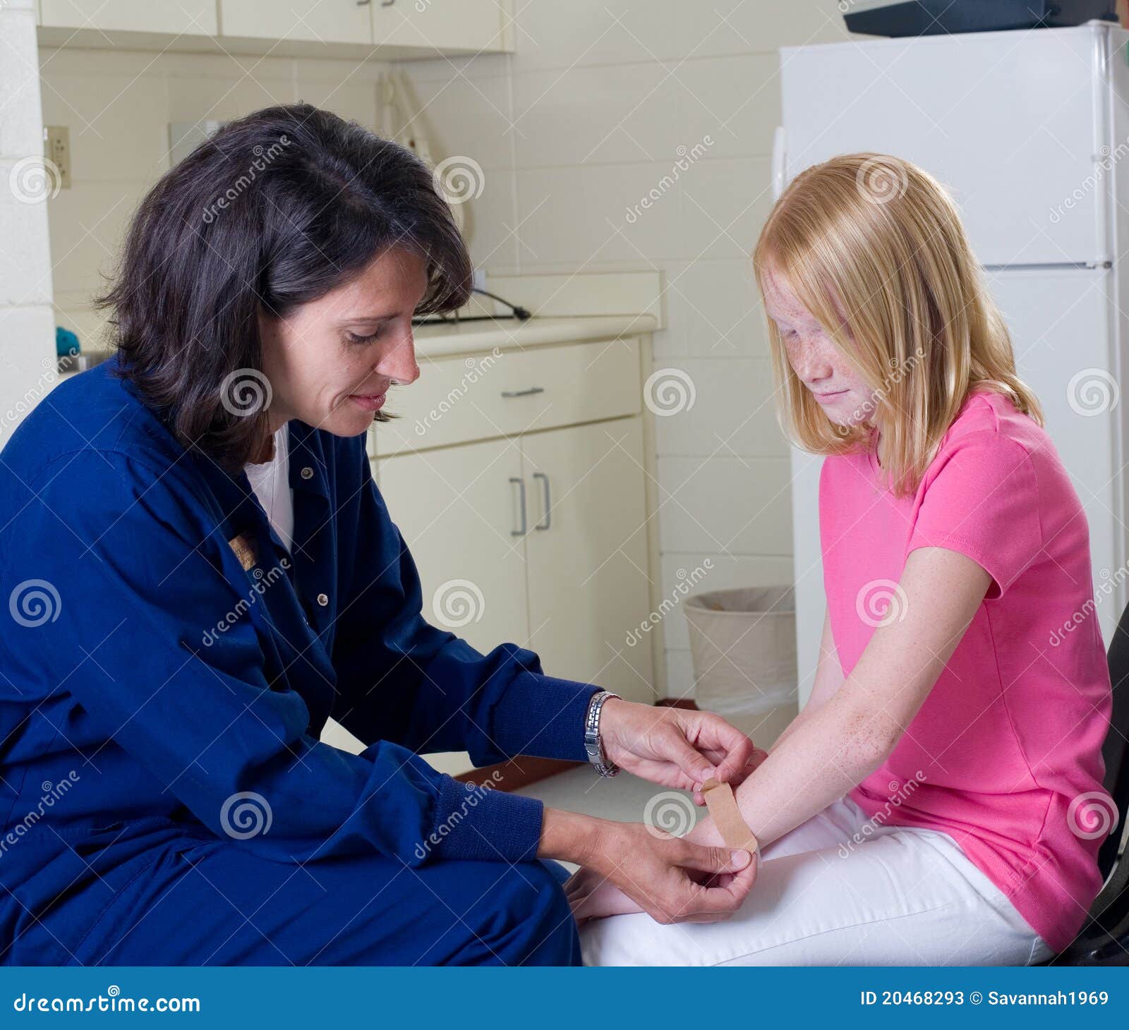Nurse Giving Band Aid To Patient Stock Image Image of woman, medical 20468293