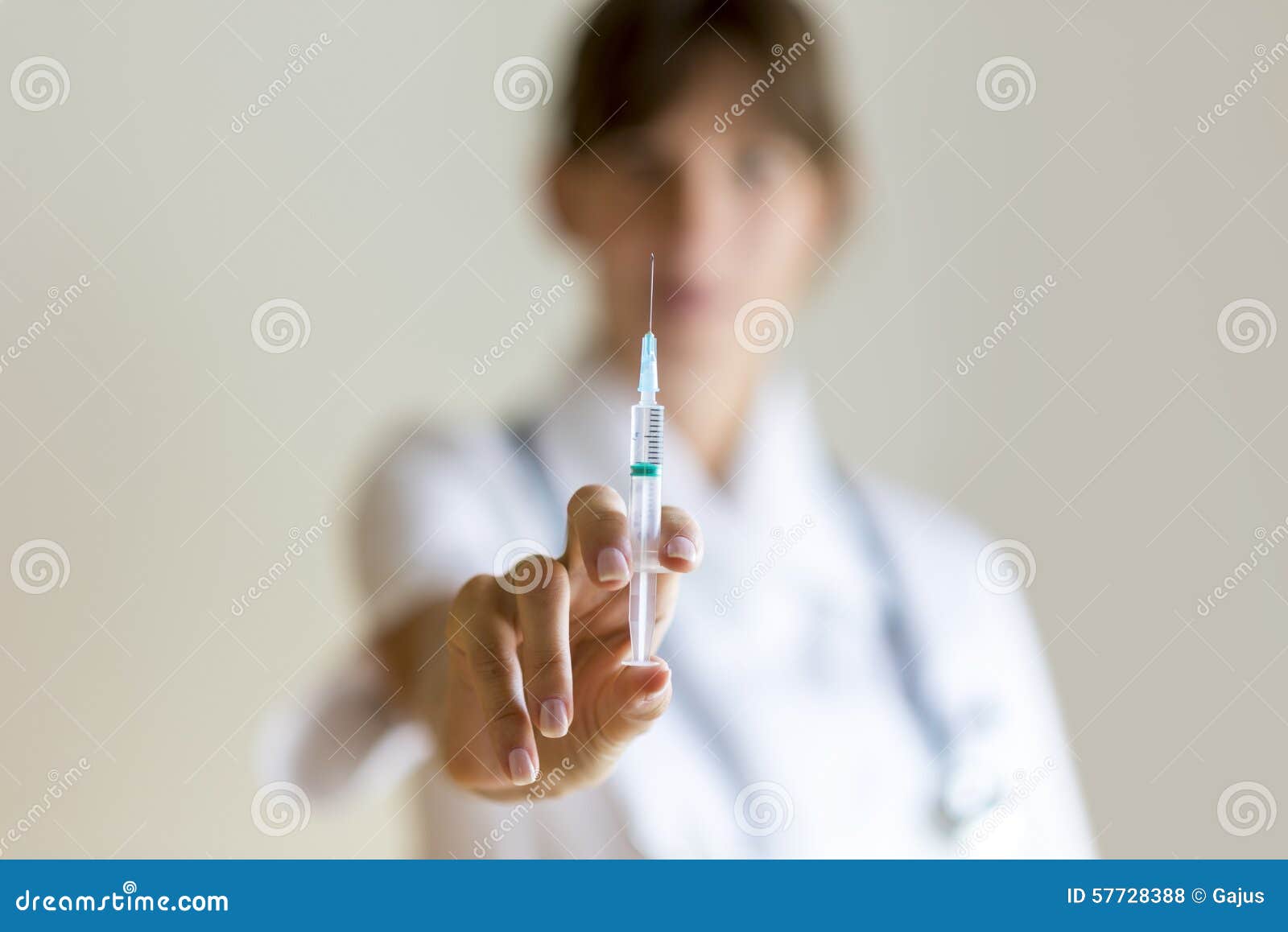 nurse holding an injection needle