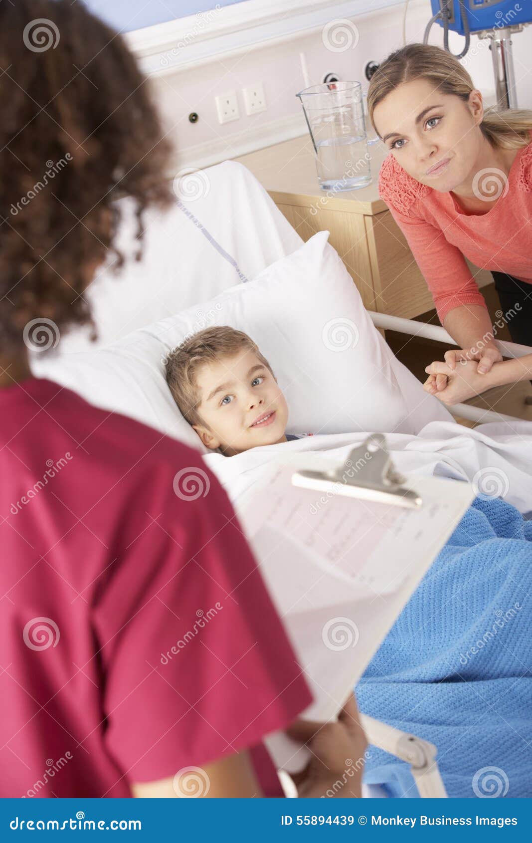 Nurse in Hospital with Sick Boy and Mother Stock Image Image of